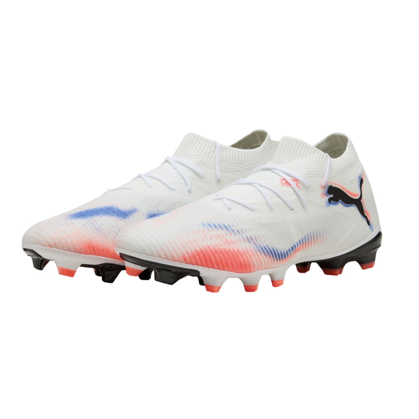 A pair of white Puma soccer cleats with red and blue graphic accents and a black logo, shown against a black background.