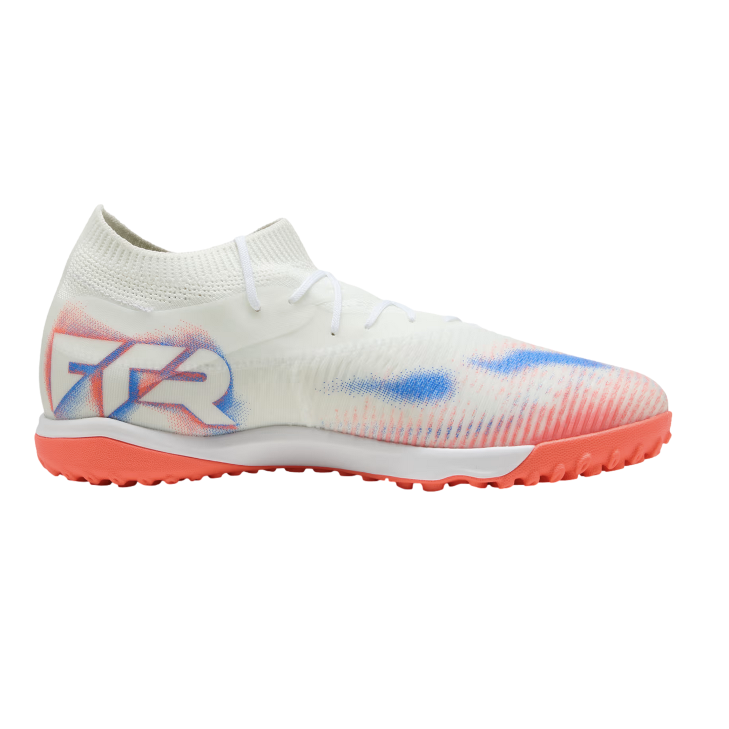 White turf soccer shoe with red and blue graphics, "FTR" branding on the heel, and a red-orange studded outsole. Shown from a side profile against a black background.