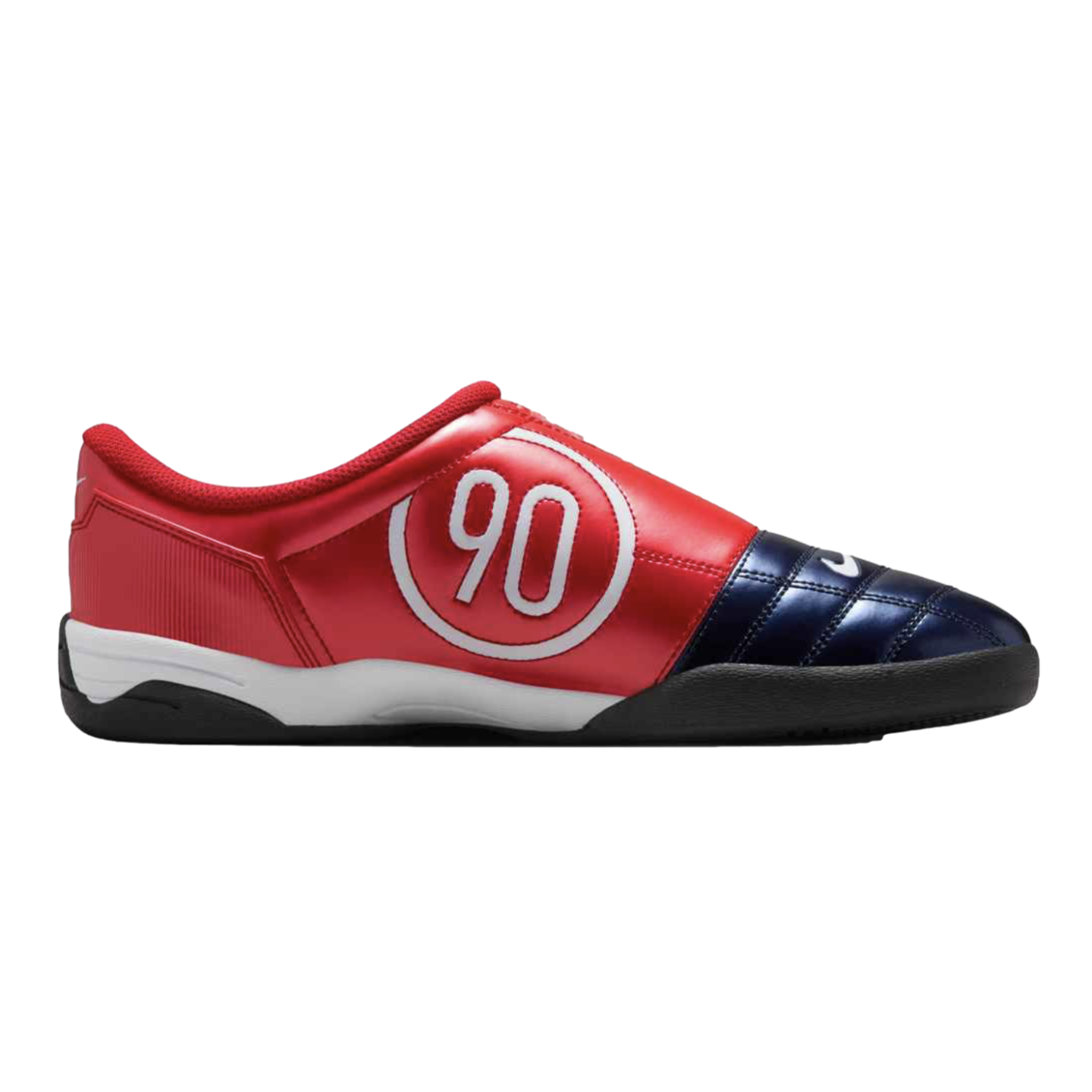 A metallic red and navy blue Nike Total 90 indoor soccer shoe with a white "90" logo in a circle on the side and a black rubber sole.