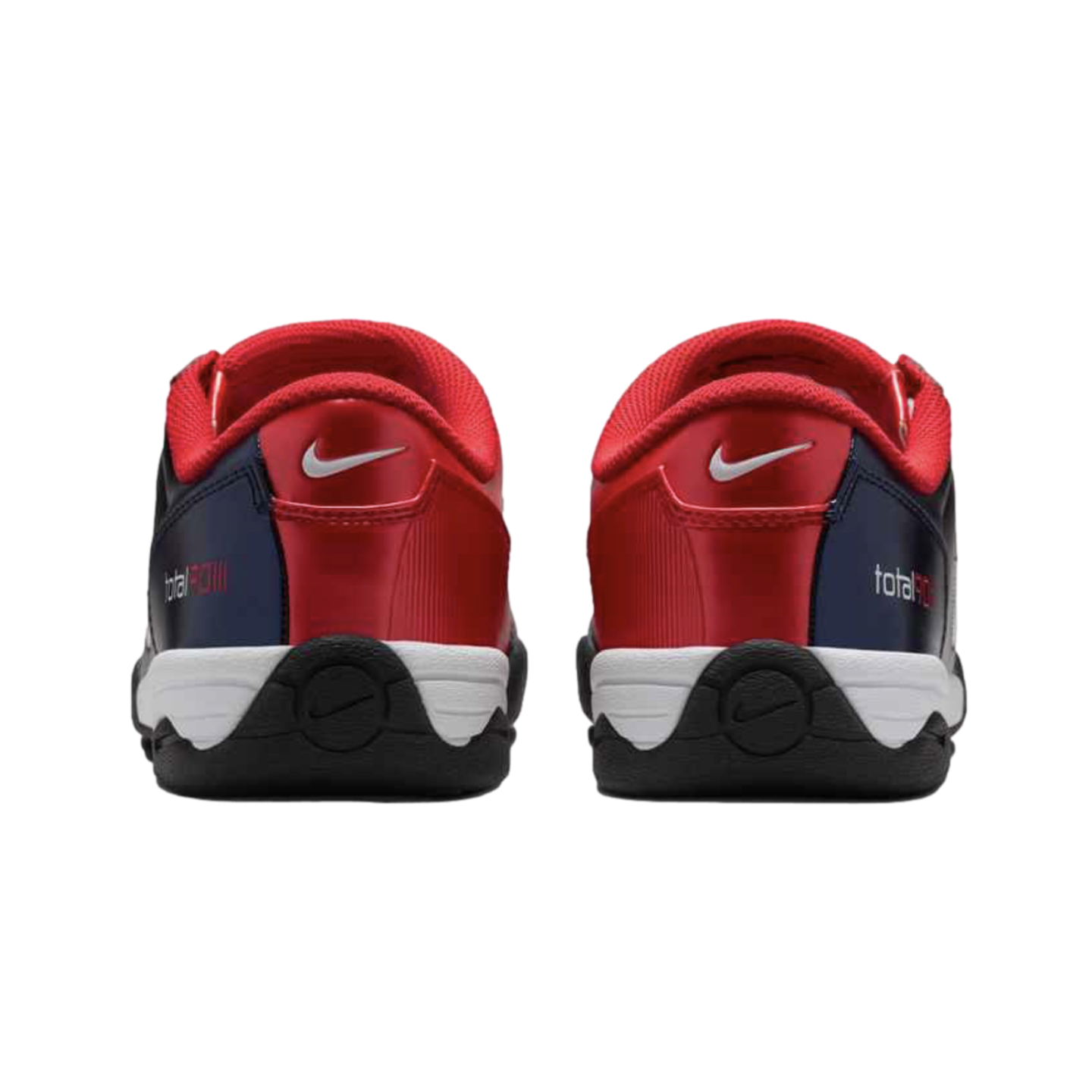 Rear view of red, navy, and white Nike Total 90 III sneakers against a black background, featuring silver swoosh logos on the heels.