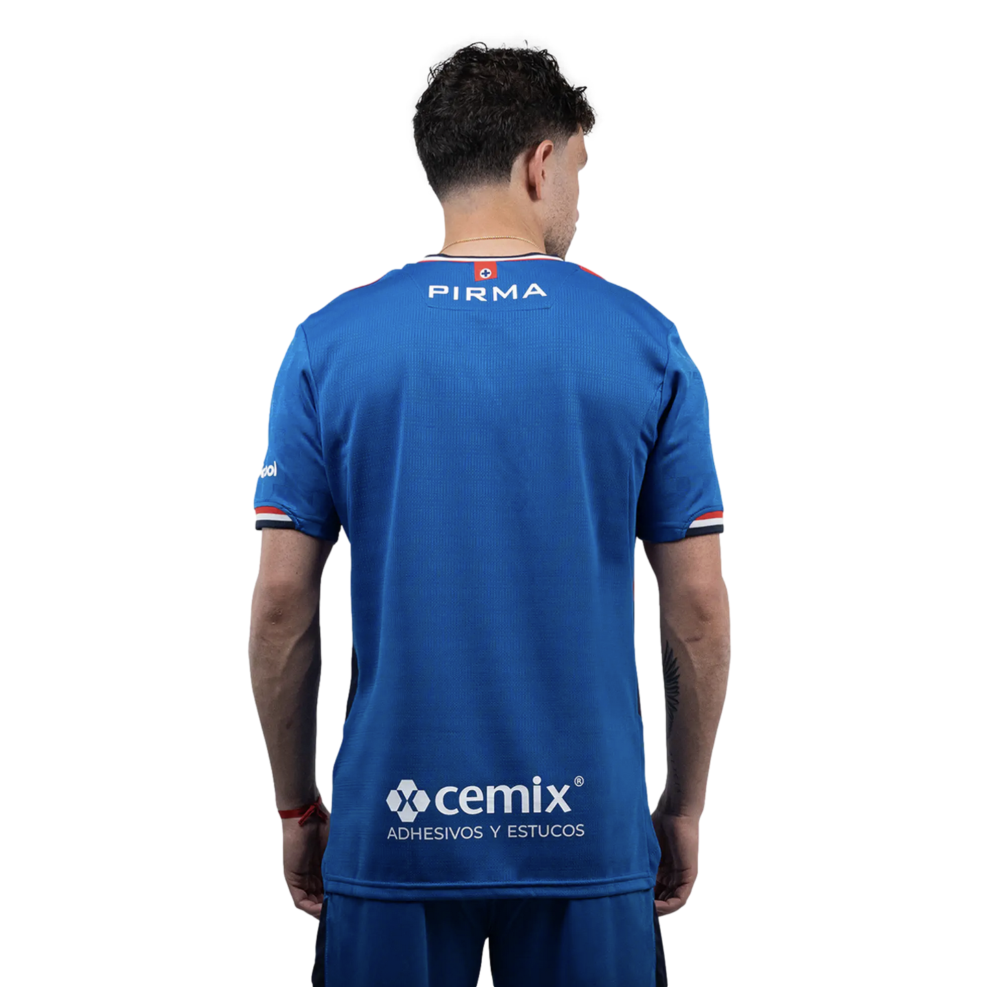 Back view of a man in a blue sports jersey with "PIRMA" and "cemix" logos and red and white trim, set against a black background.