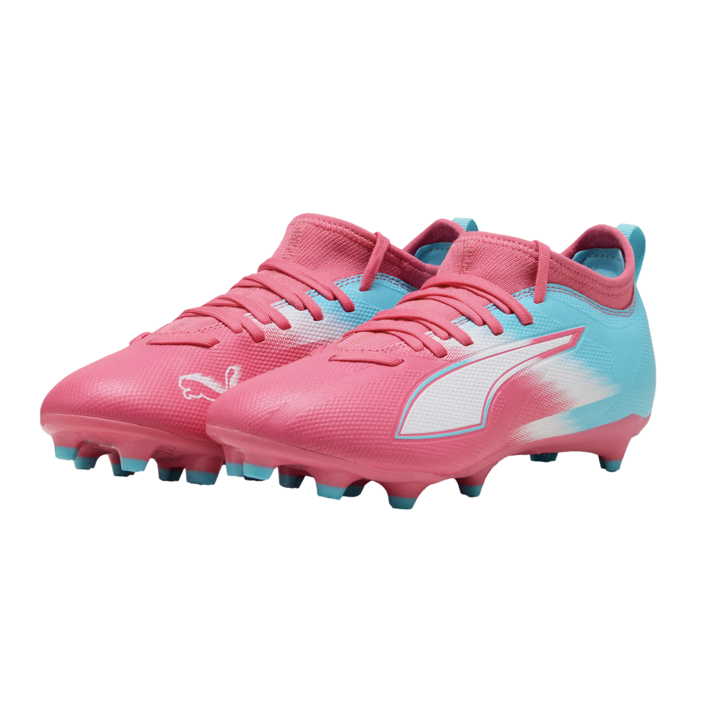 A pair of pink and light blue Puma soccer cleats with white accents, shown against a solid black background.