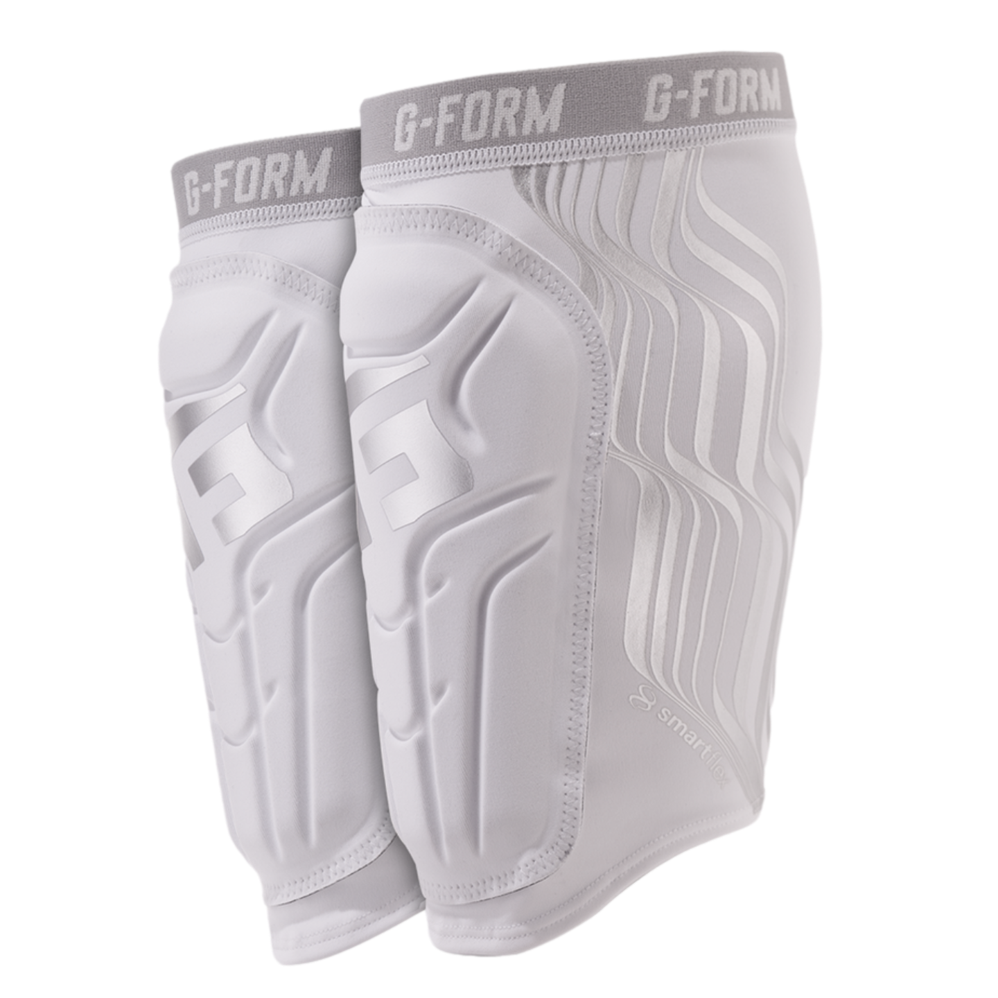 White G-FORM shin guard sleeves with silver contoured padding and grey elastic bands, shown against a black background.