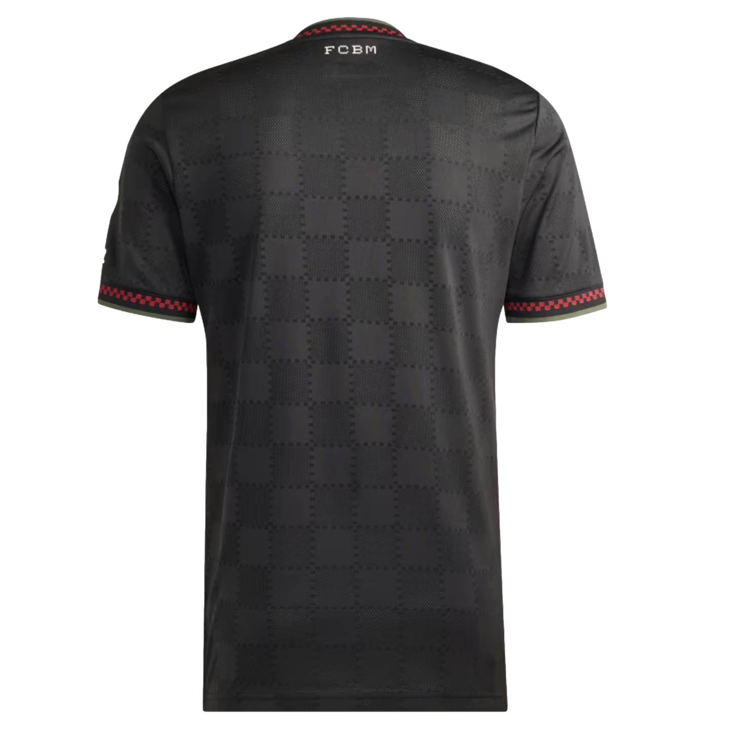 The back of a black soccer jersey with a subtle checkered pattern, "FCBM" printed on the neck, and red-and-black checkered trim on the collar and sleeves.