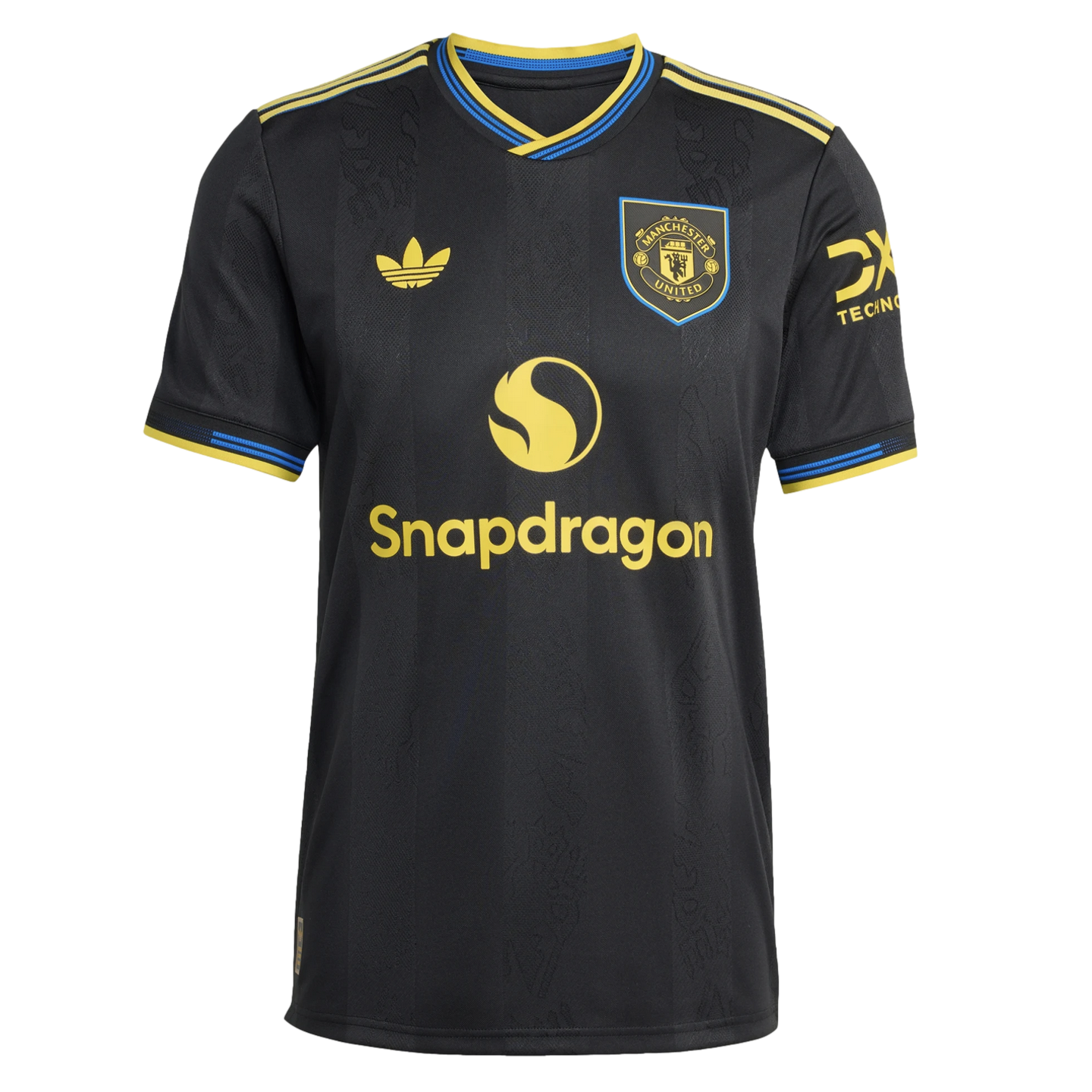 A black Manchester United soccer jersey with yellow Adidas and Snapdragon logos, a club crest, and blue and yellow trim on the collar and sleeves.