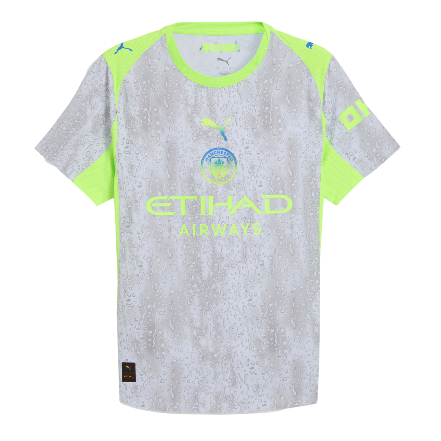 Manchester City Puma jersey in grey with a water droplet pattern and neon green sleeves. Centered team crest and Etihad Airways logo.