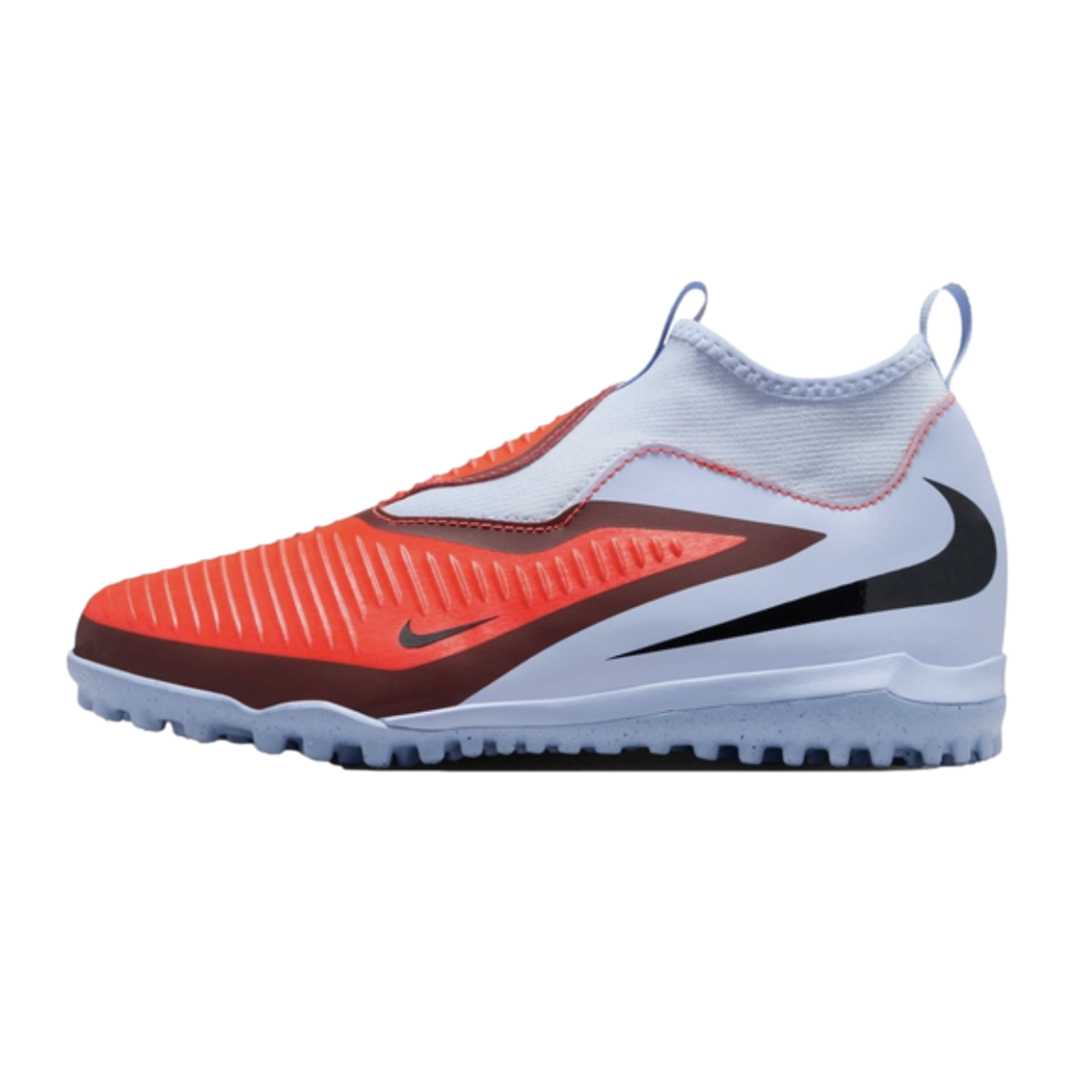 A laceless Nike soccer shoe with a textured orange forefoot, light blue upper, and black Swoosh, featuring a studded outsole for turf surfaces.