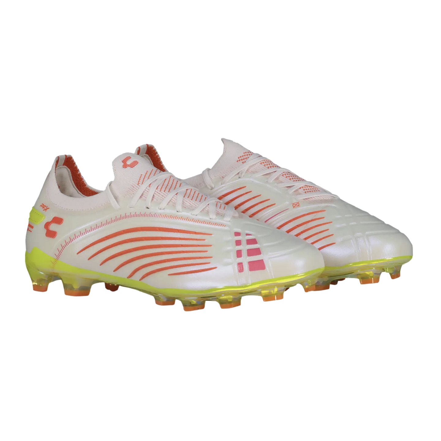 Pair of white Charly soccer cleats with orange curved stripes, yellow soles, and orange studs, angled against a black background.