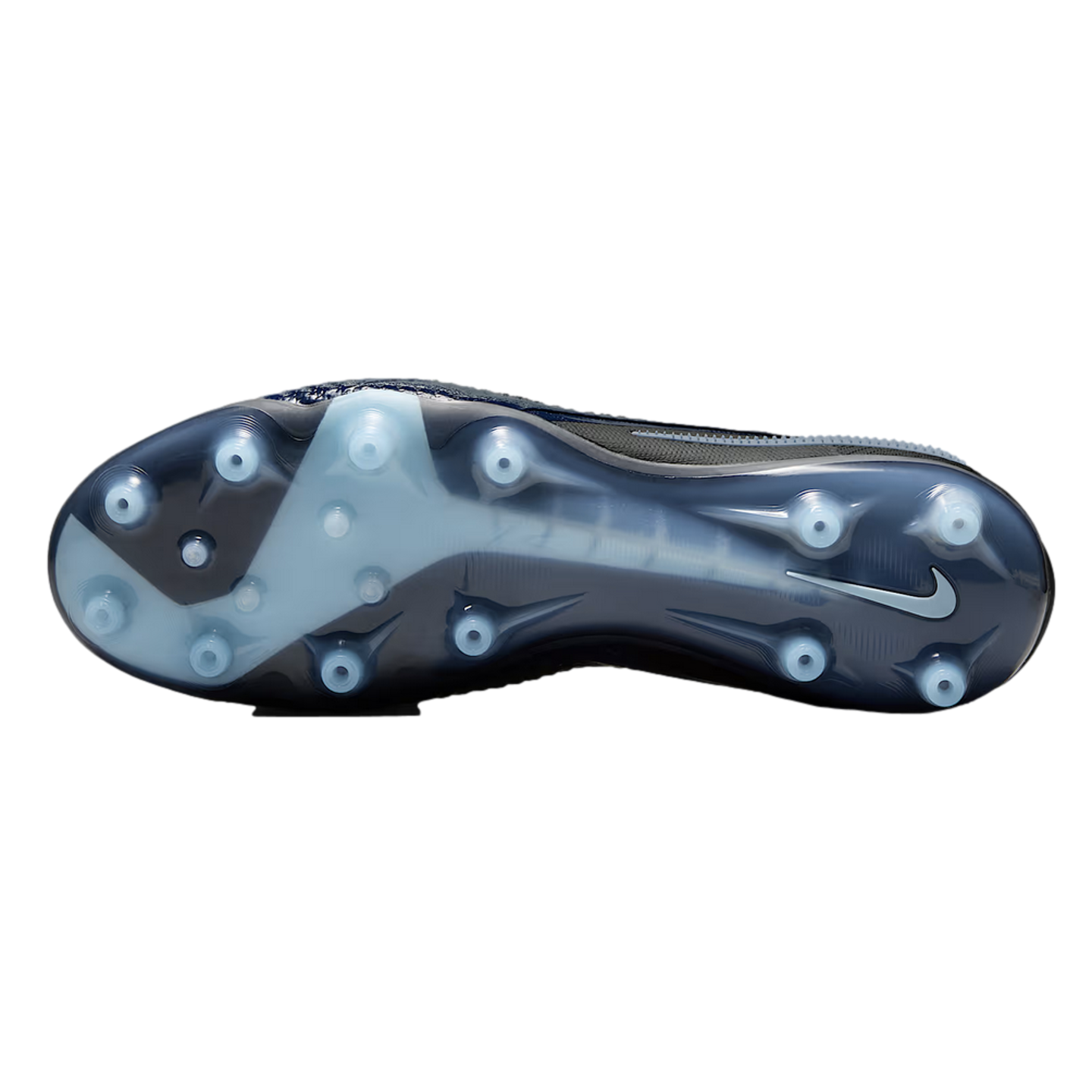 Bottom view of a Nike soccer cleat featuring a translucent blue soleplate with white conical studs and a swoosh logo on a black background.