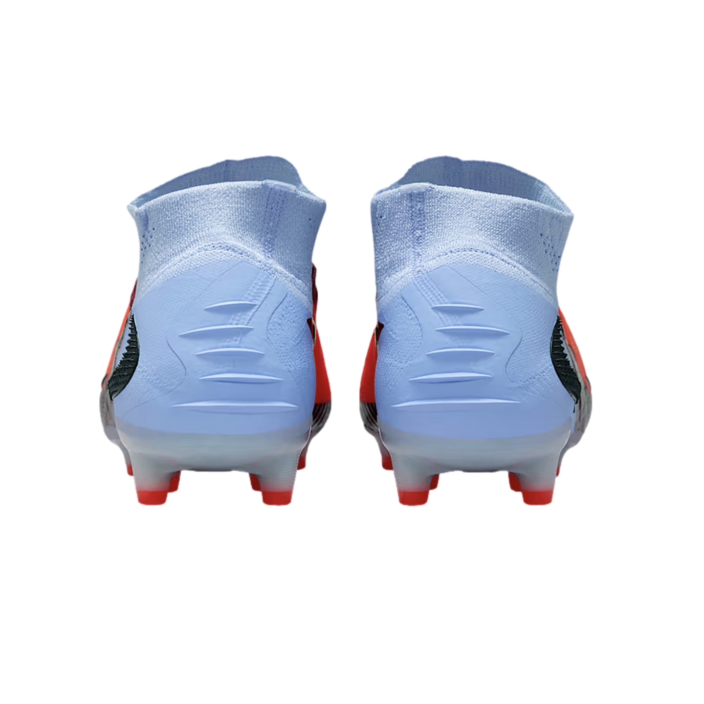Rear view of light blue and red soccer cleats with high-top collars and textured heels, against a black background.