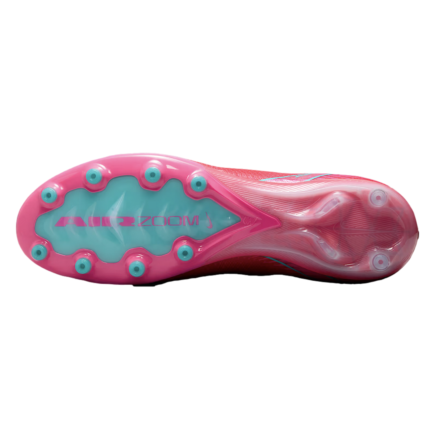 Underside of a pink and teal Nike soccer cleat featuring circular studs and "AIR ZOOM" branding on a light blue sole plate.