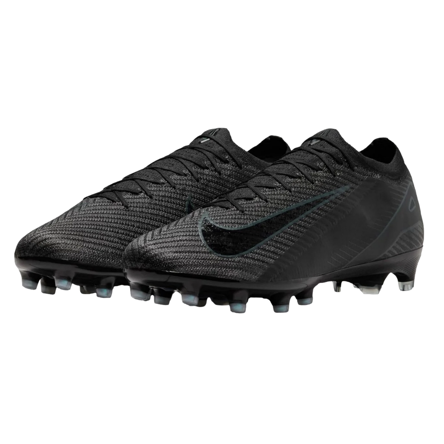 A pair of all-black Nike soccer cleats with a textured upper and clear studs, shown against a black background.