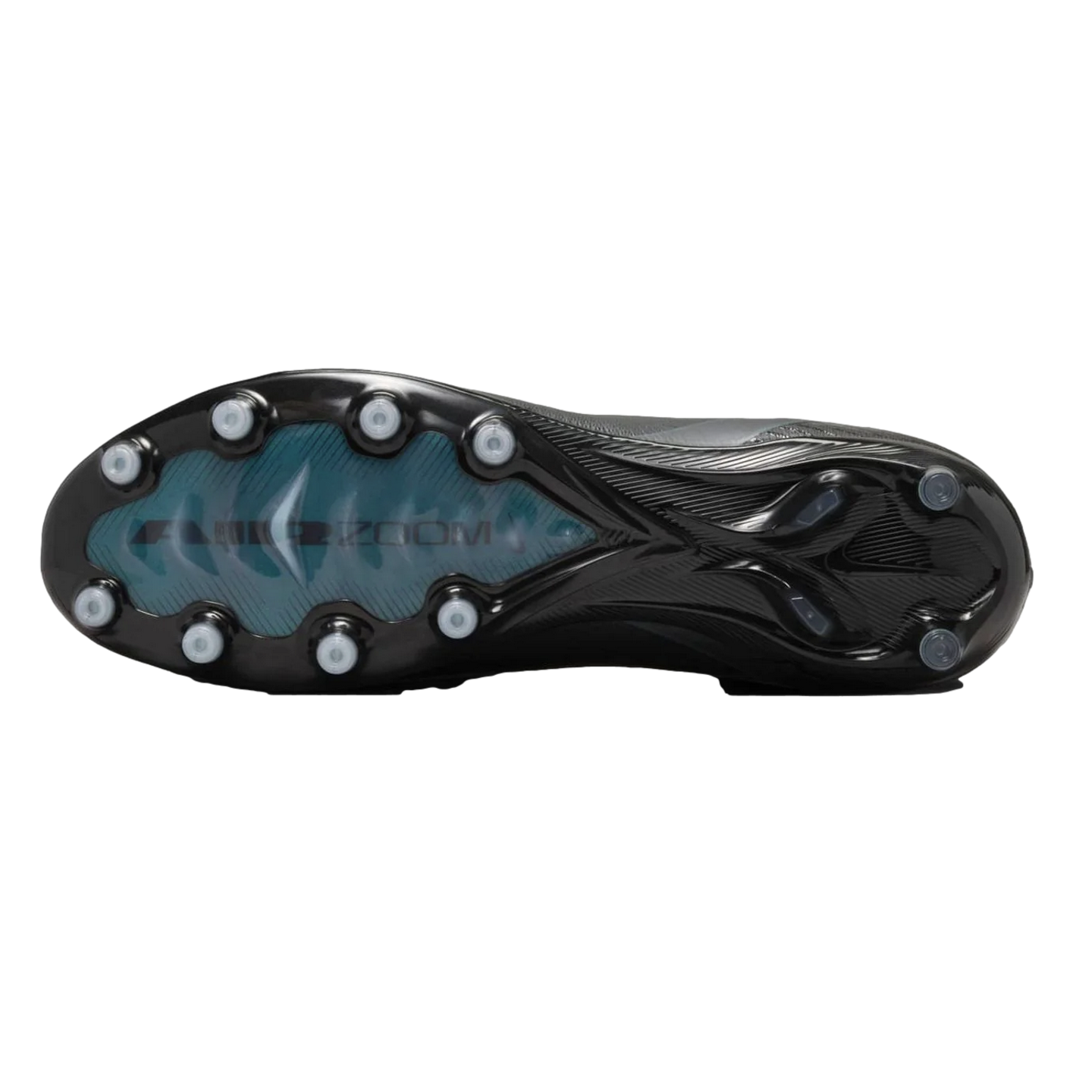 Sole of a black Nike soccer cleat with round translucent studs and a visible teal Air Zoom unit in the forefoot.