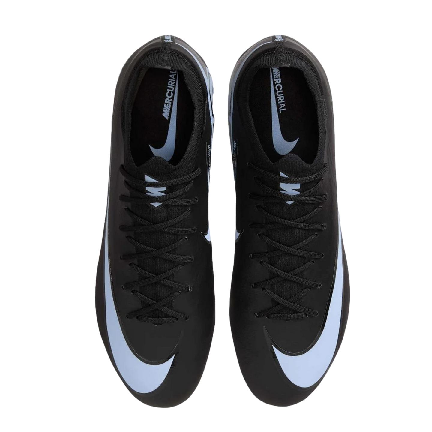 Top-down view of a pair of black Nike Mercurial soccer cleats with large white swooshes against a black background.
