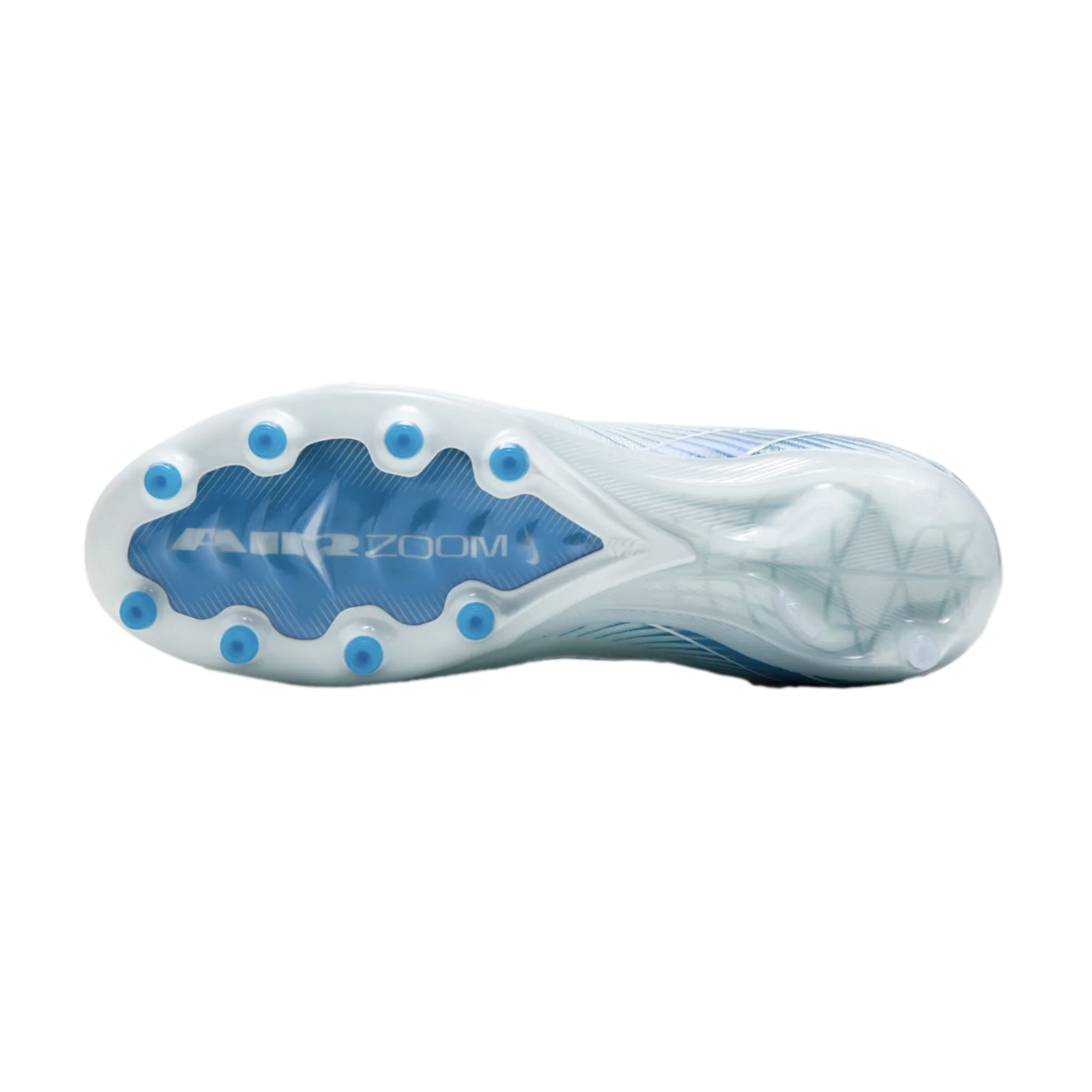 The bottom view of a white and blue Nike soccer cleat soleplate showing circular studs and "AIR ZOOM" branding.