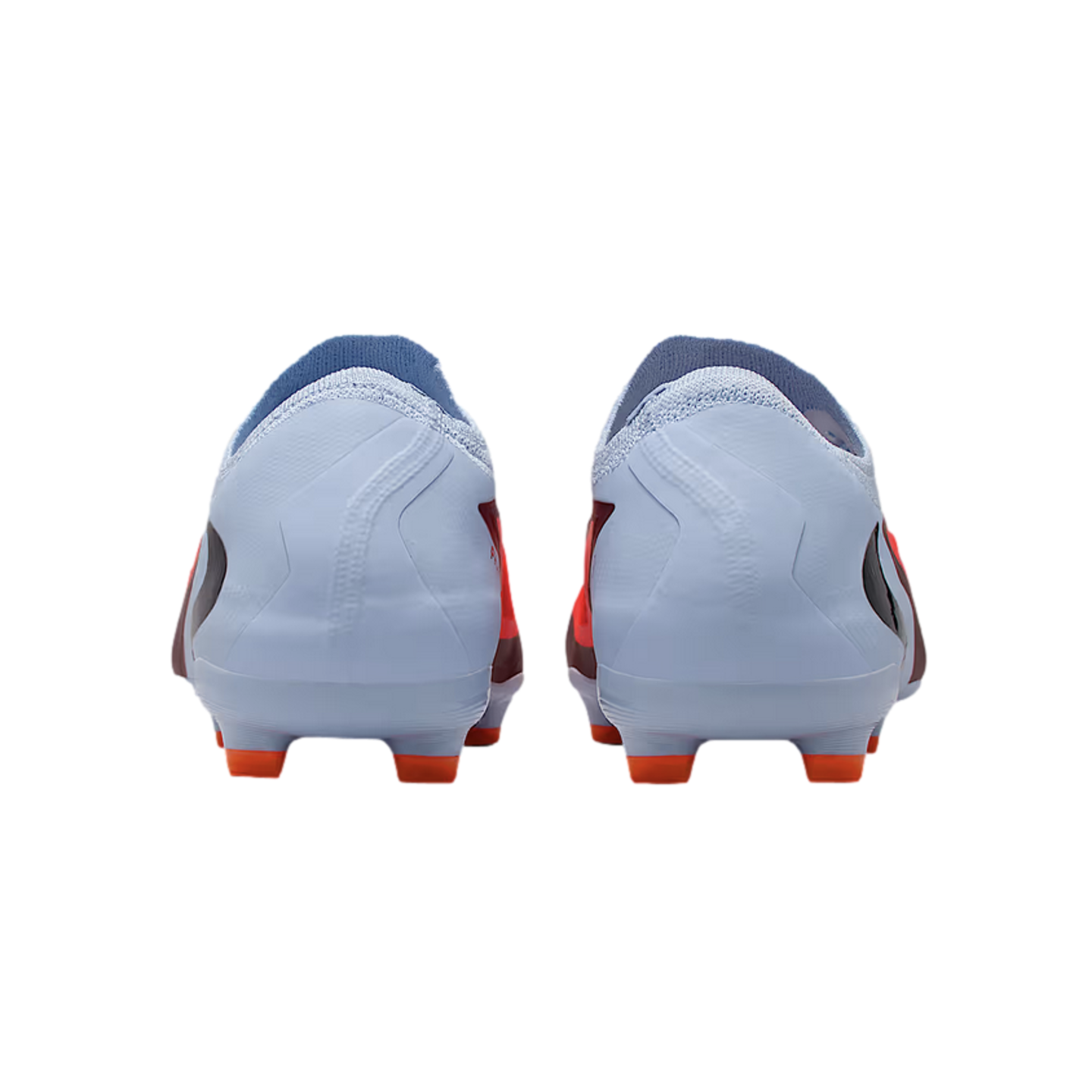 Rear view of a pair of light blue soccer cleats with bright orange studs, set against a solid black background.