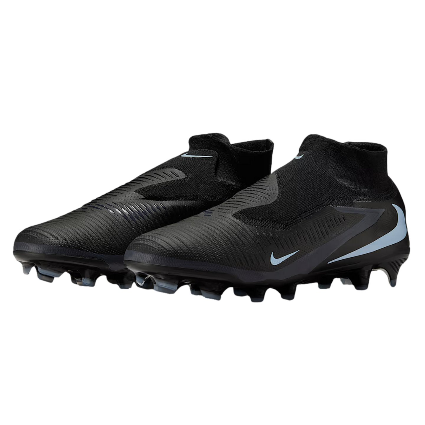 Pair of black laceless Nike soccer cleats with light blue accents and a textured upper on a black background.
