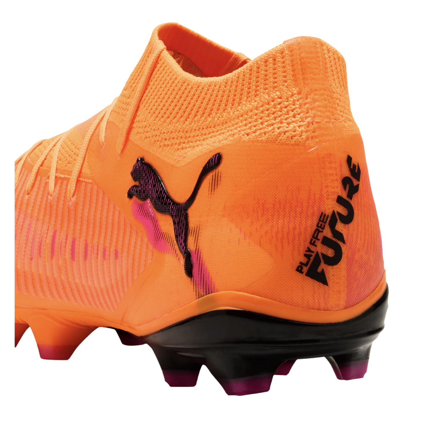 Bright orange Puma soccer cleat with a sock-like collar, black cat logo, and "PLAY FREE FUTURE" text on the heel, shown from a rear-quarter angle.
