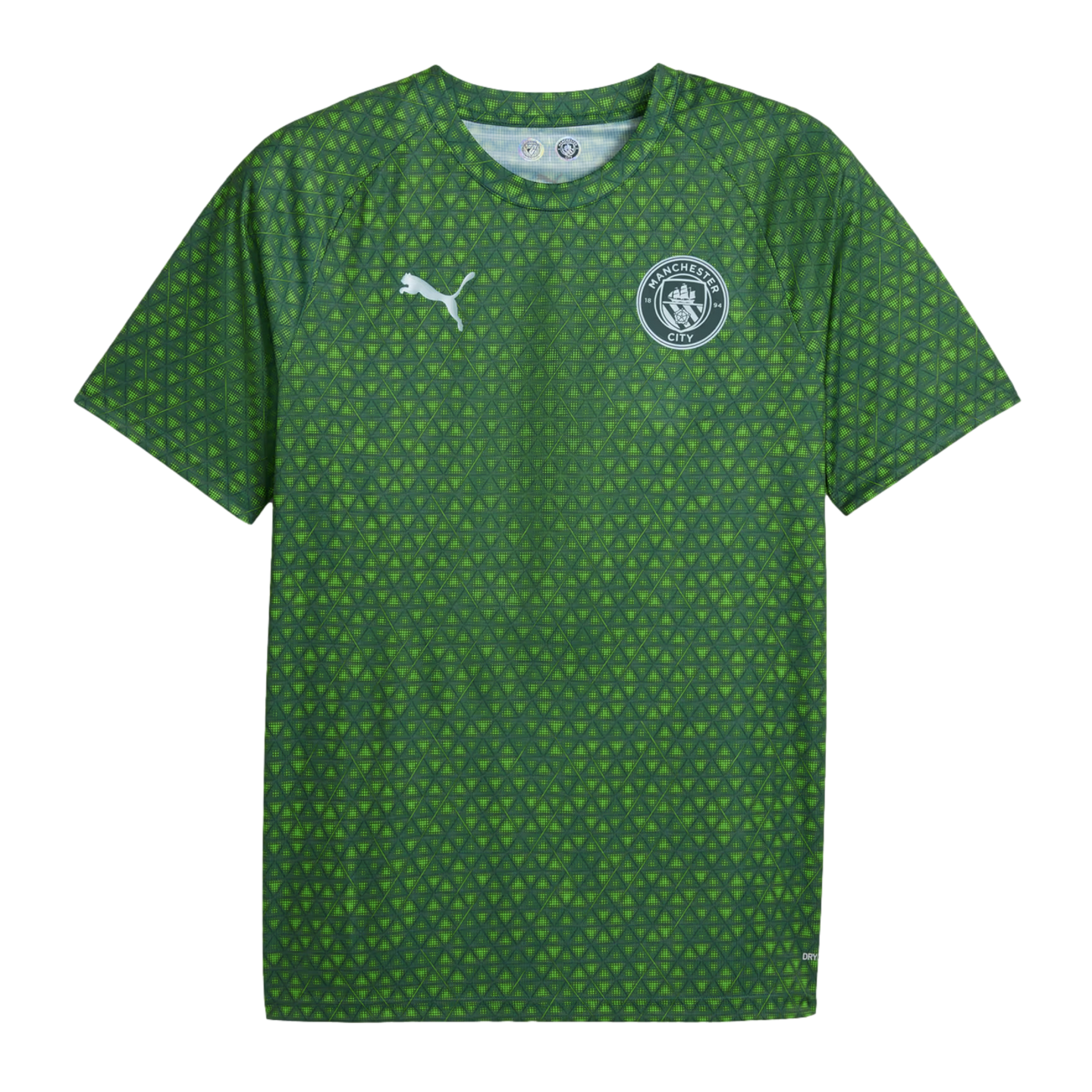 Green Manchester City FC short-sleeved training jersey featuring an all-over geometric pattern, a white Puma logo, and the club's crest.