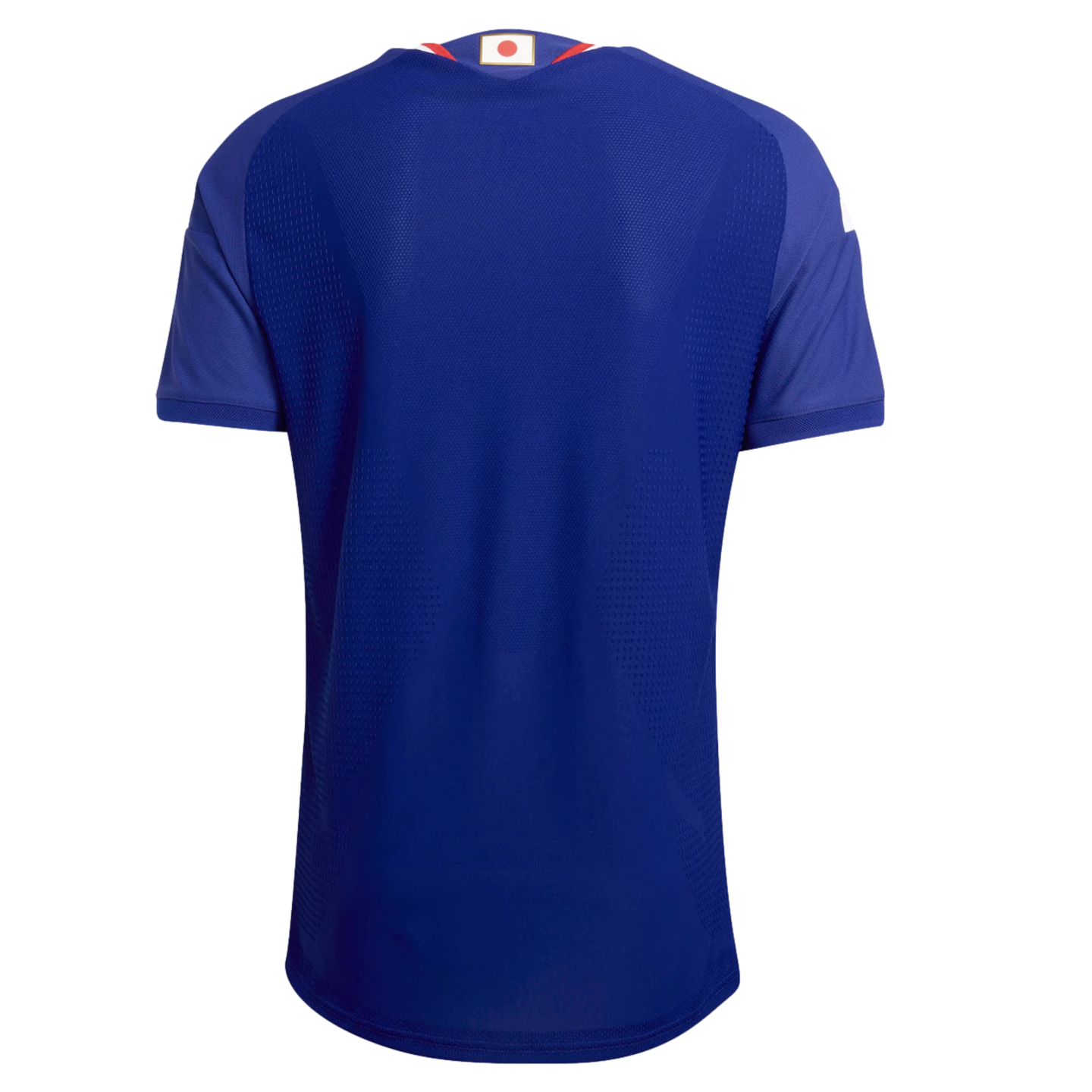 Back view of a blue short-sleeved soccer jersey featuring a small Japanese flag on the collar and a textured fabric pattern.