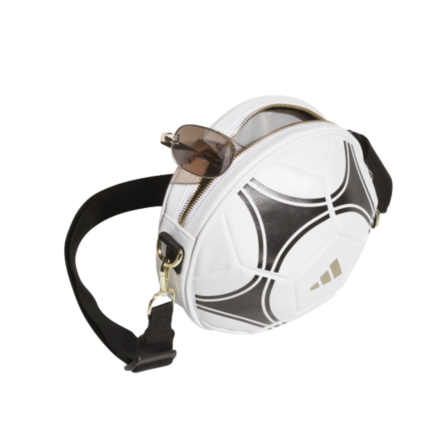 A small round purse shaped like a white and black Adidas soccer ball with sunglasses tucked into its open zipper.