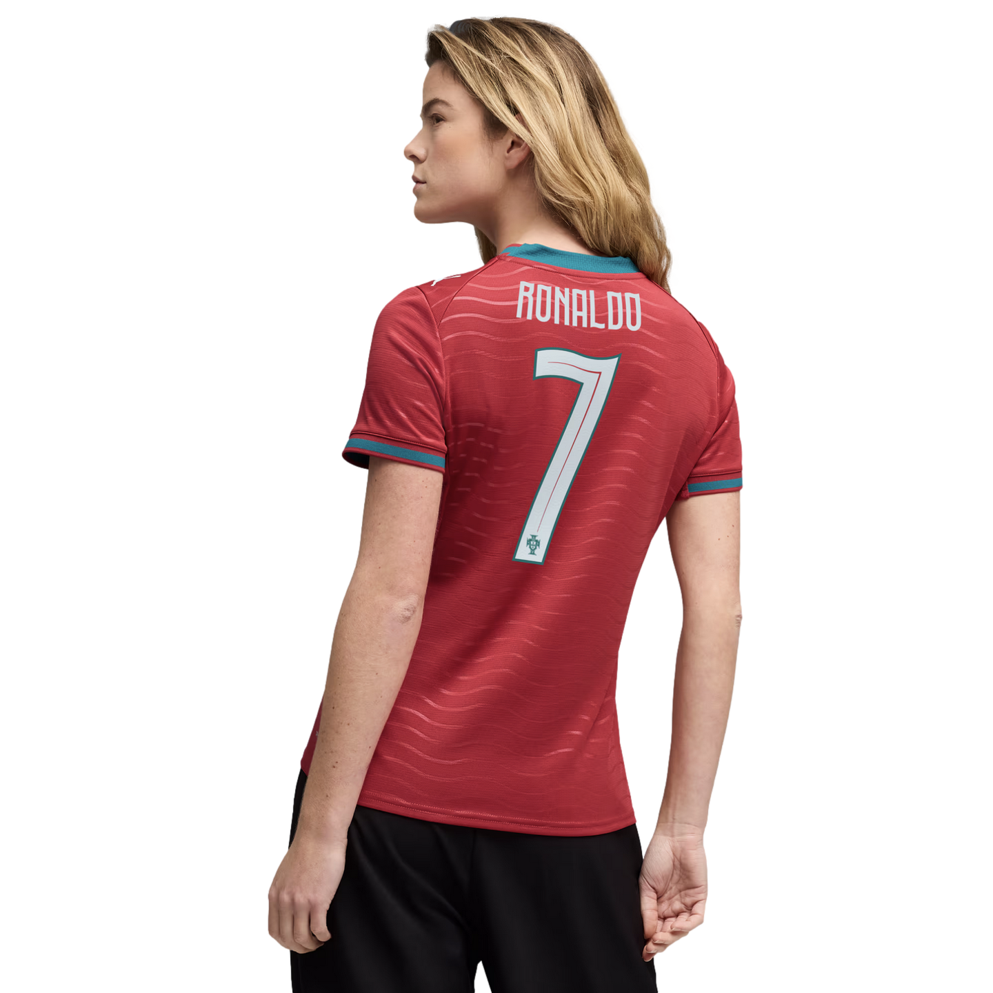 Back view of a woman with blonde hair wearing a red Portugal soccer jersey with "RONALDO" and "7" on the back, against a plain black background.