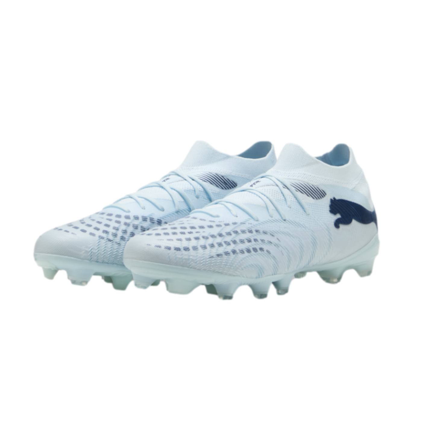 A pair of light blue Puma soccer cleats with dark blue accents and a textured upper, displayed against a black background.
