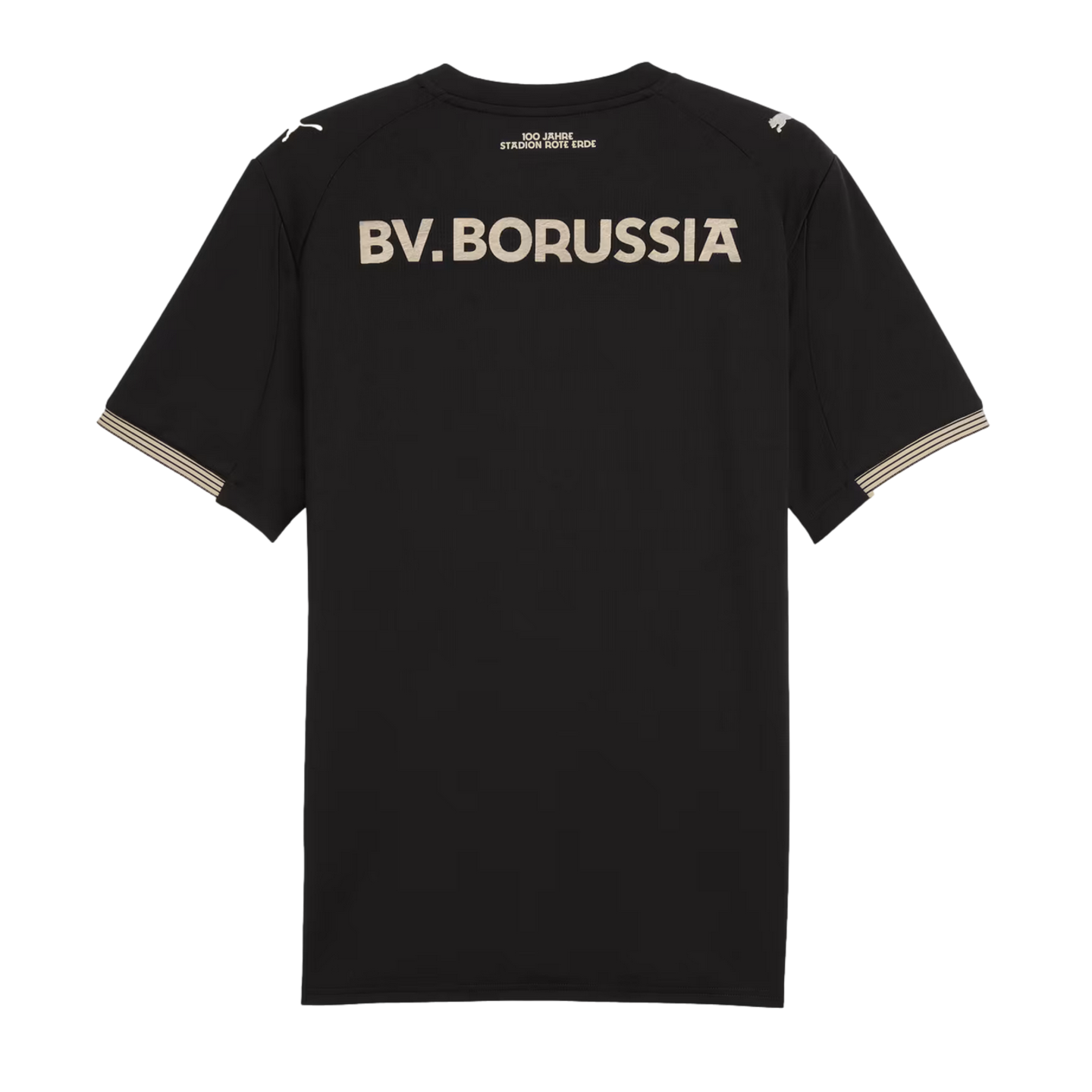 Back of a black football jersey with "BV. BORUSSIA" in large cream vintage font. Small anniversary text sits above it, with striped sleeve cuffs and a Puma logo on the shoulder.