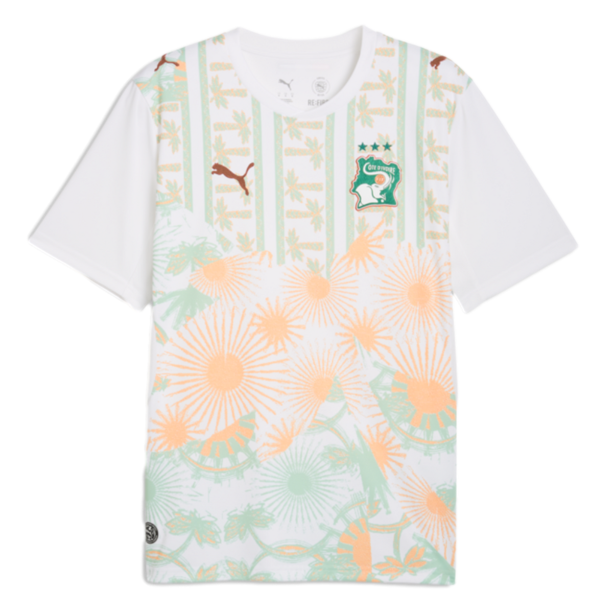 White Puma Côte d’Ivoire soccer jersey featuring a green and orange tropical pattern with palm trees, sunbursts, and the national team crest.
