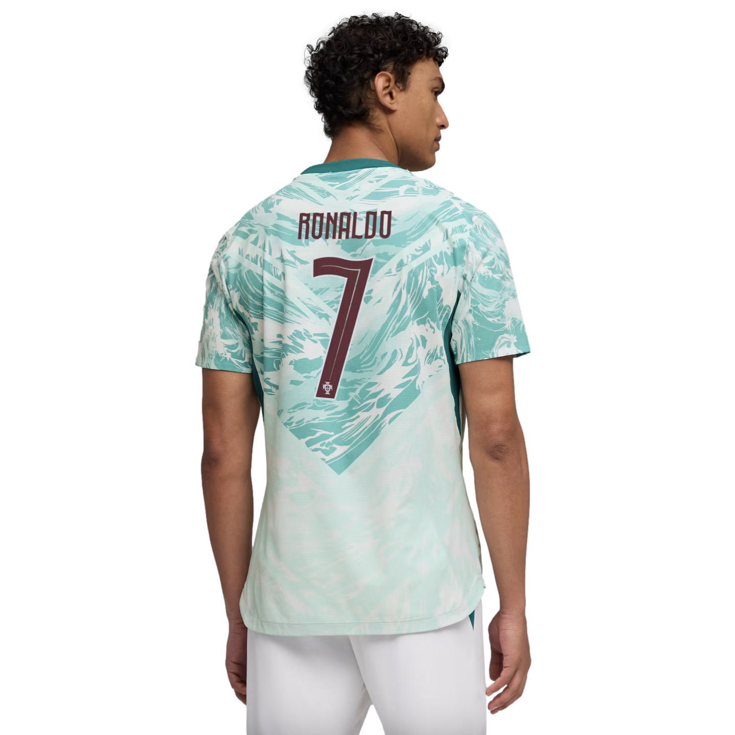 A man seen from behind wearing a light teal and white patterned Portugal soccer jersey with "RONALDO" and the number "7" printed in maroon on the back.