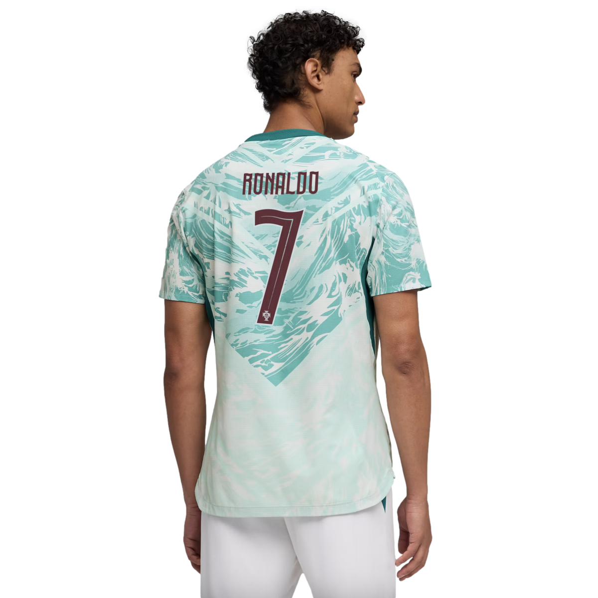 A man seen from behind wearing a light teal and white patterned Portugal soccer jersey with "RONALDO" and the number "7" printed in maroon on the back.