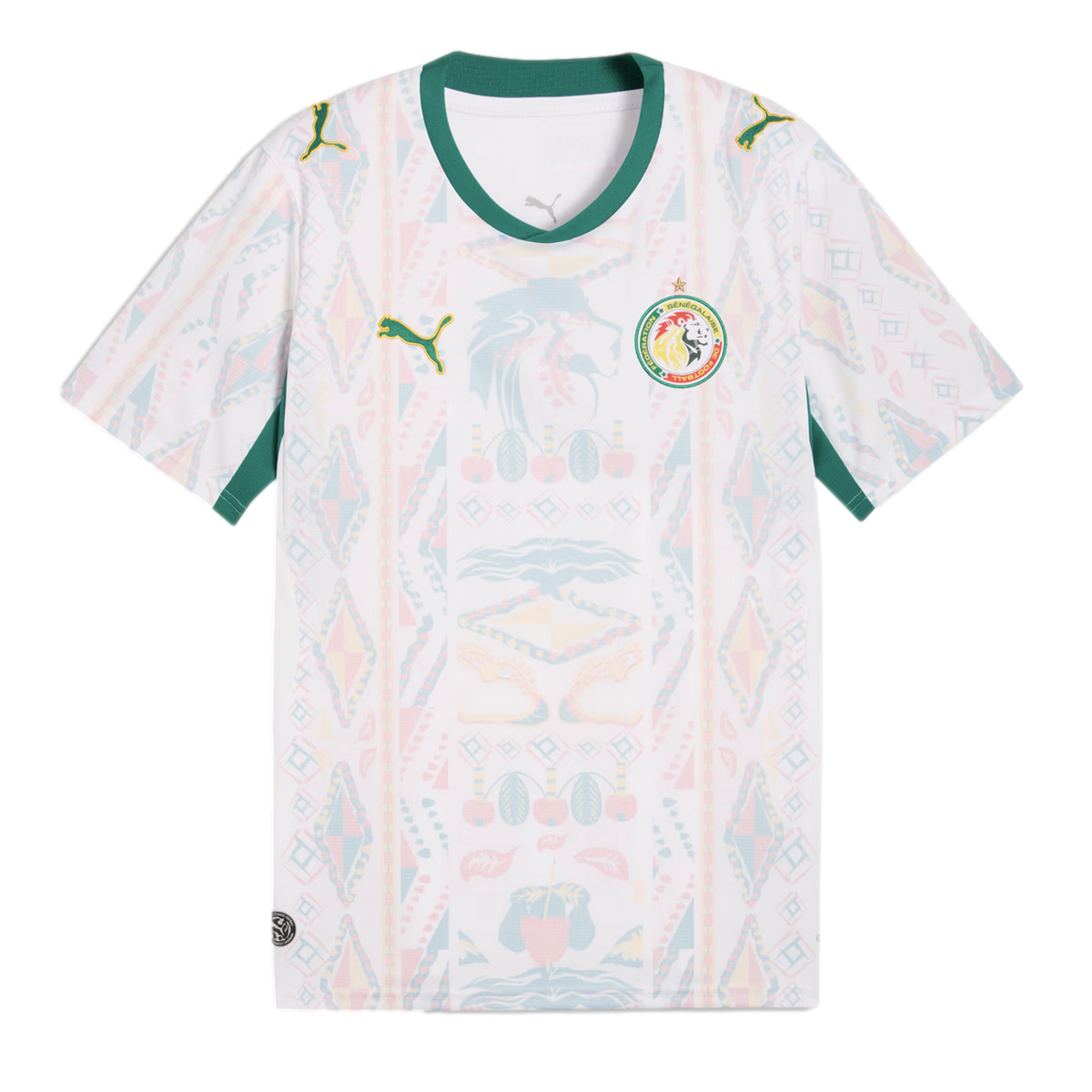 A white Senegal national football team away jersey featuring a green V-neck collar and sleeve trim. The shirt has a faint, multi-colored geometric and lion-head pattern across the front, with the Puma logo on the right chest and the Senegalese football fe