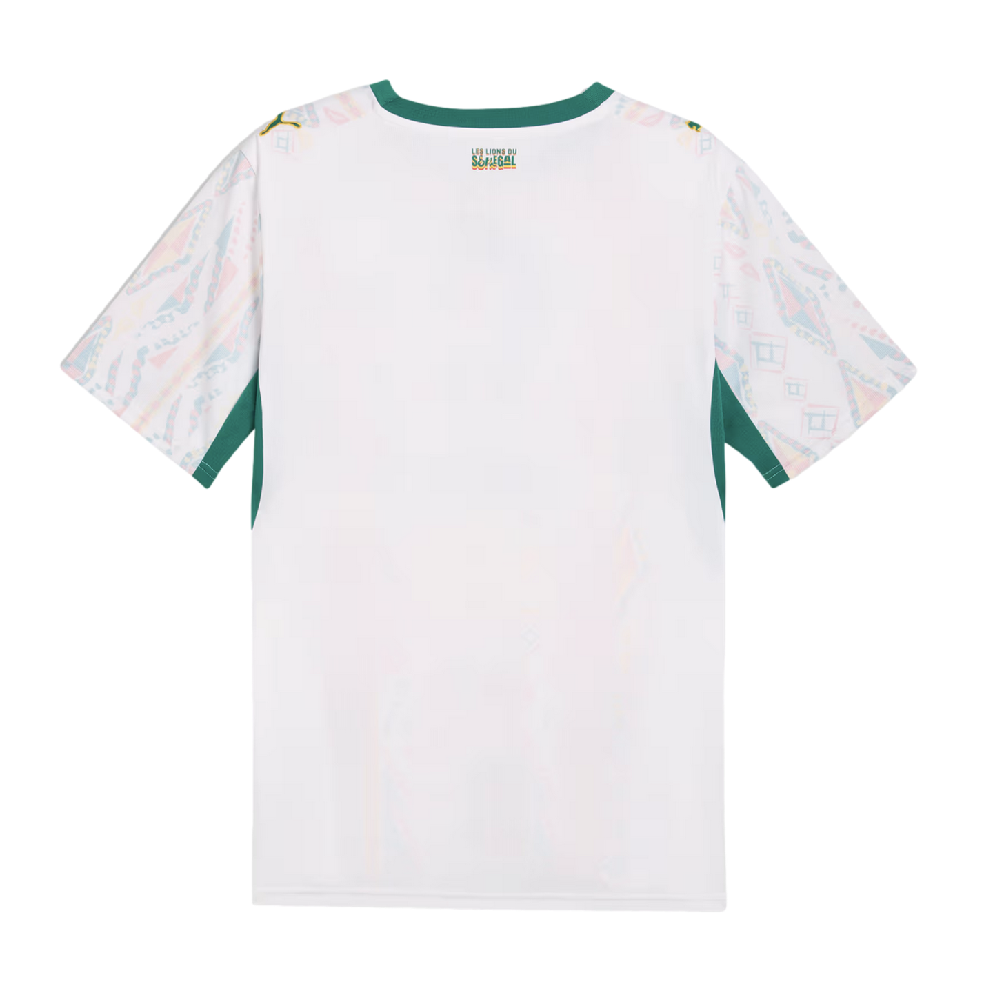 The back of a white short-sleeved jersey featuring a green crew neckline and underarm panels. The sleeves are covered in a colorful, geometric pattern, and a small logo on the upper back reads “LES LIONS DU SÉNÉGAL.”