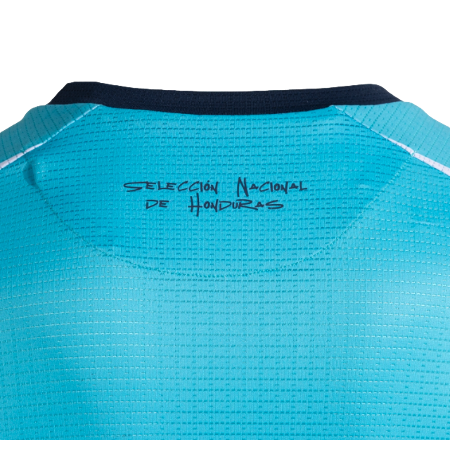 A close-up of the upper back of a cyan textured jersey, showing the dark blue text "SELECCIÓN NACIONAL DE HONDURAS" printed in a stylized font below a navy blue collar.