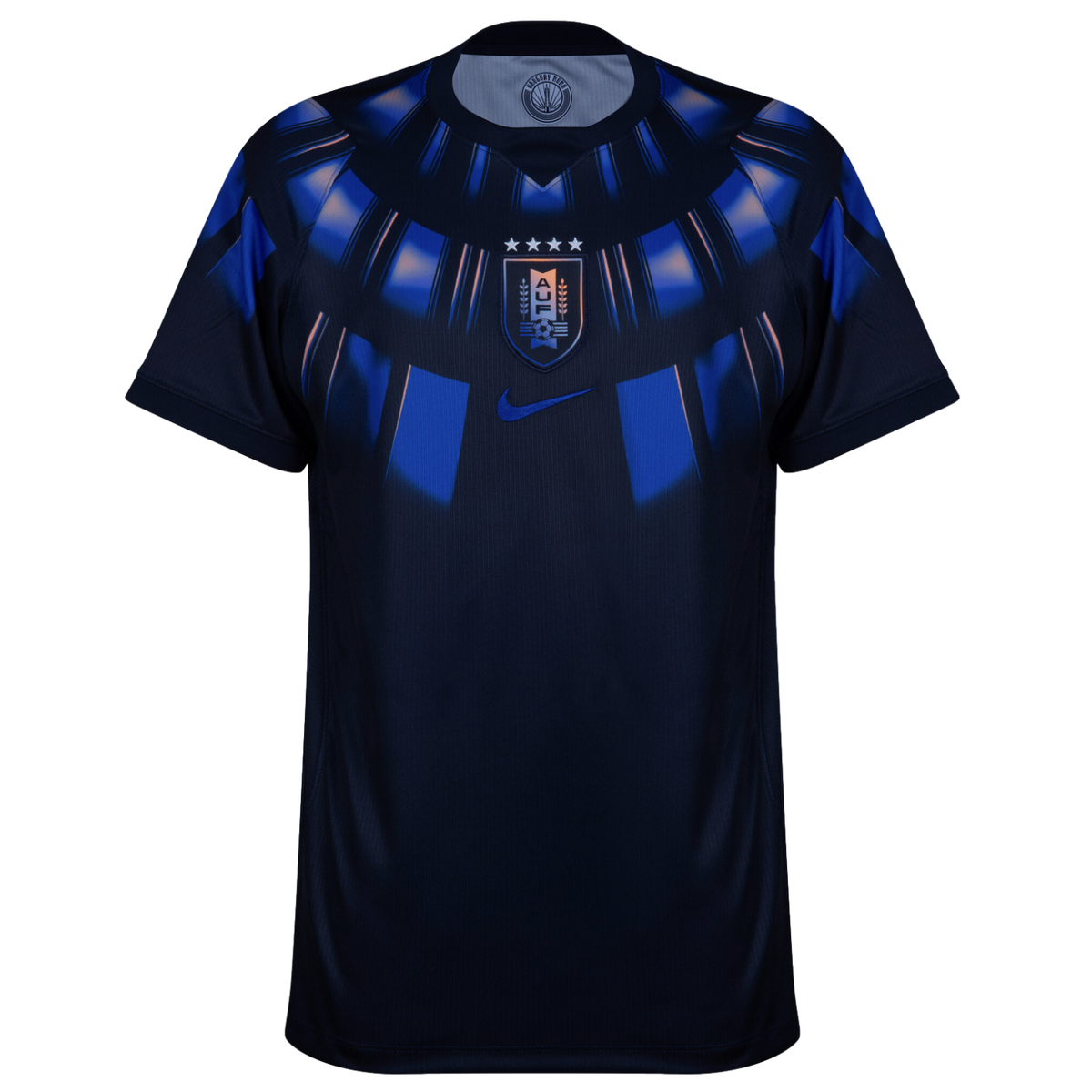 A front view of a navy blue Uruguay national team soccer jersey by Nike against a black background. The jersey features a blue and light blue radial graphic pattern around the neckline and upper chest. The Uruguay (AUF) team crest with four stars is cente