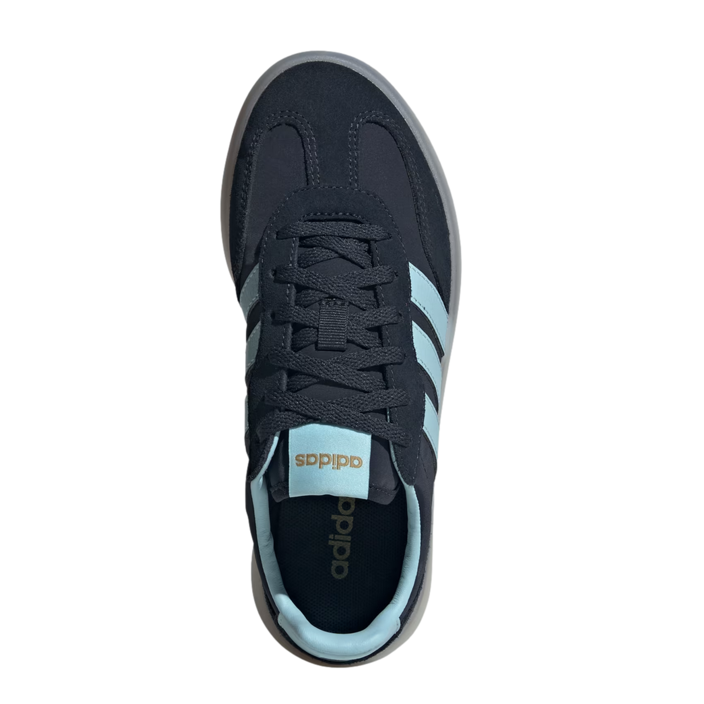 An overhead view of a navy blue Adidas sneaker with light blue stripes, tongue tag, and inner lining. The shoe features navy laces and a translucent grey sole, set against a solid black background.