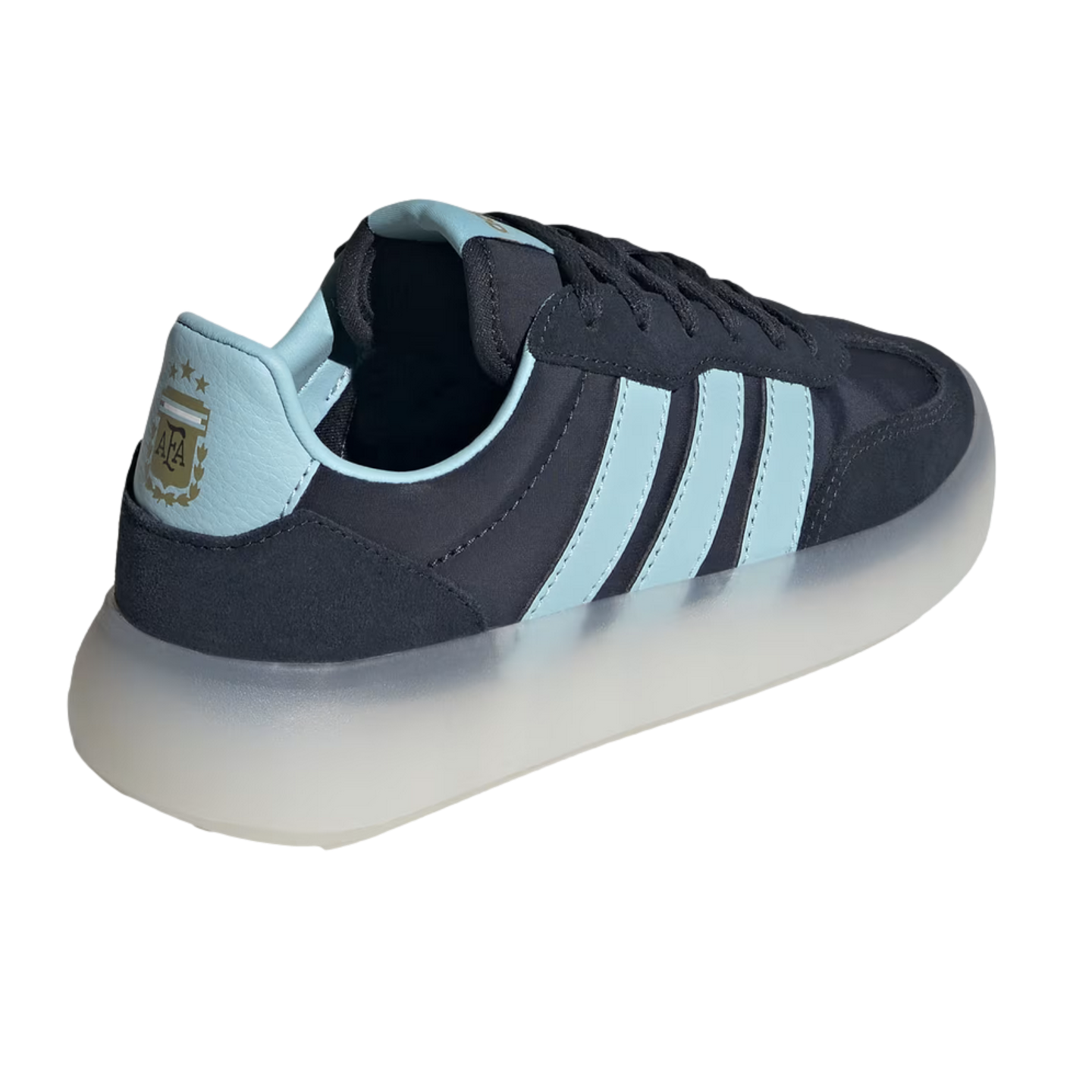 A navy blue and light blue sneaker shown from a rear three-quarter angle against a black background. It features three light blue side stripes, a light blue heel tab with a gold Argentina national football team (AFA) crest and three stars, and a thick, tr