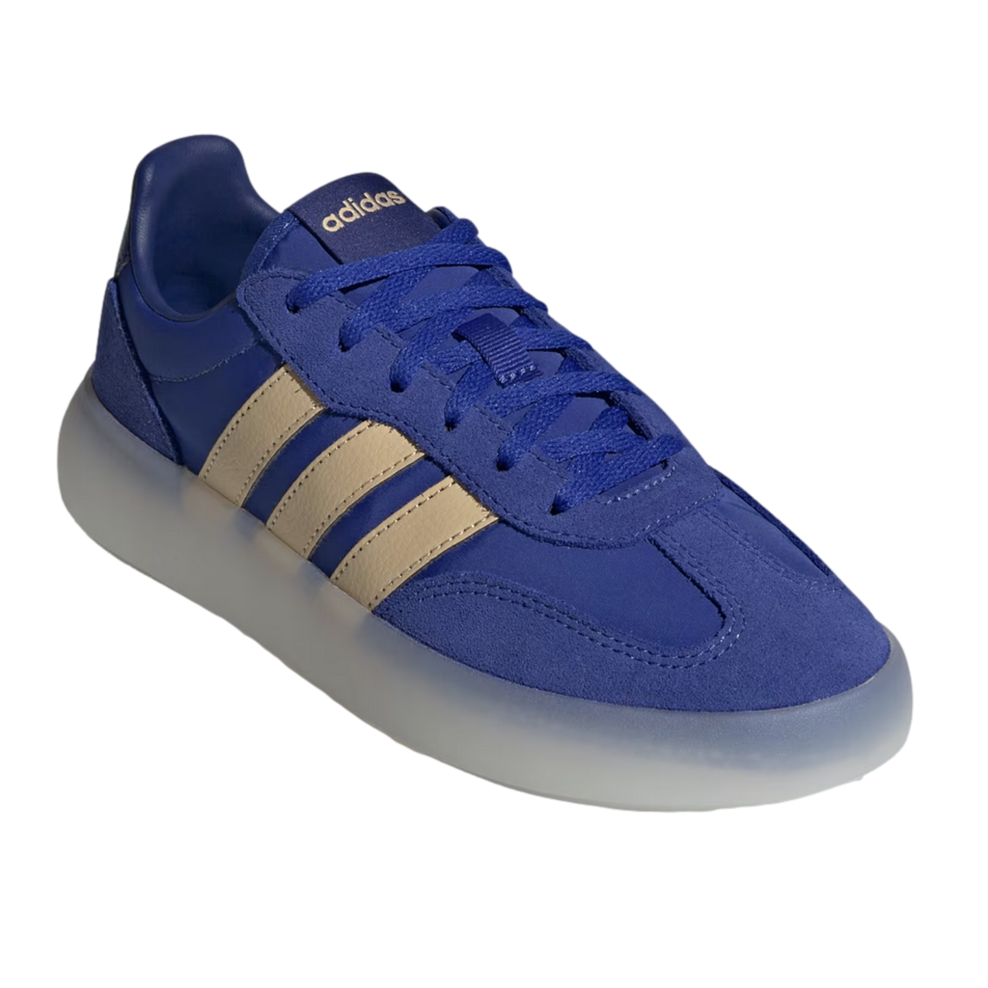 An angled view of a royal blue Adidas sneaker featuring light tan side stripes and a thick, translucent white platform sole, set against a solid black background.