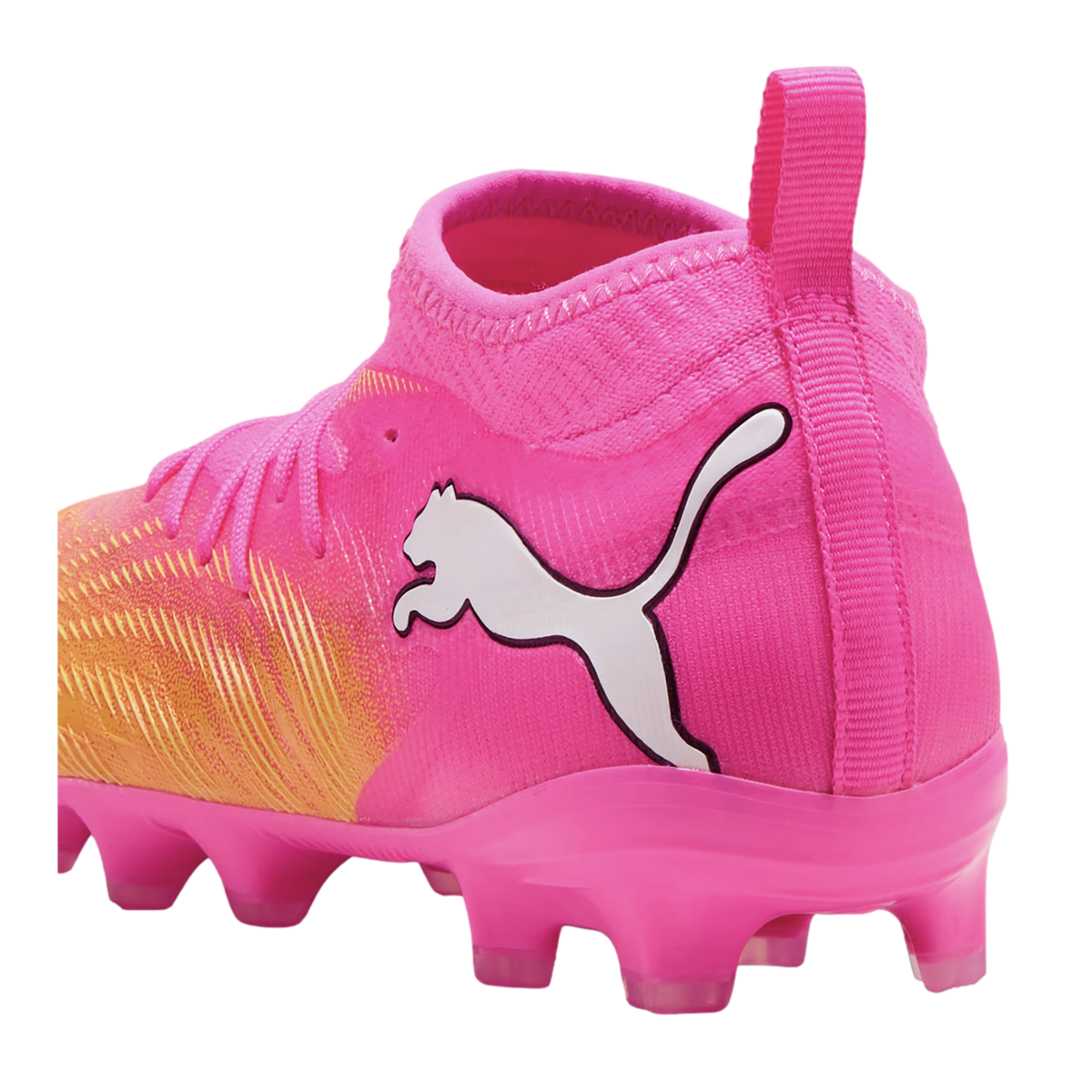 A bright pink and orange Puma soccer cleat with a white logo and a sock-like ankle collar.