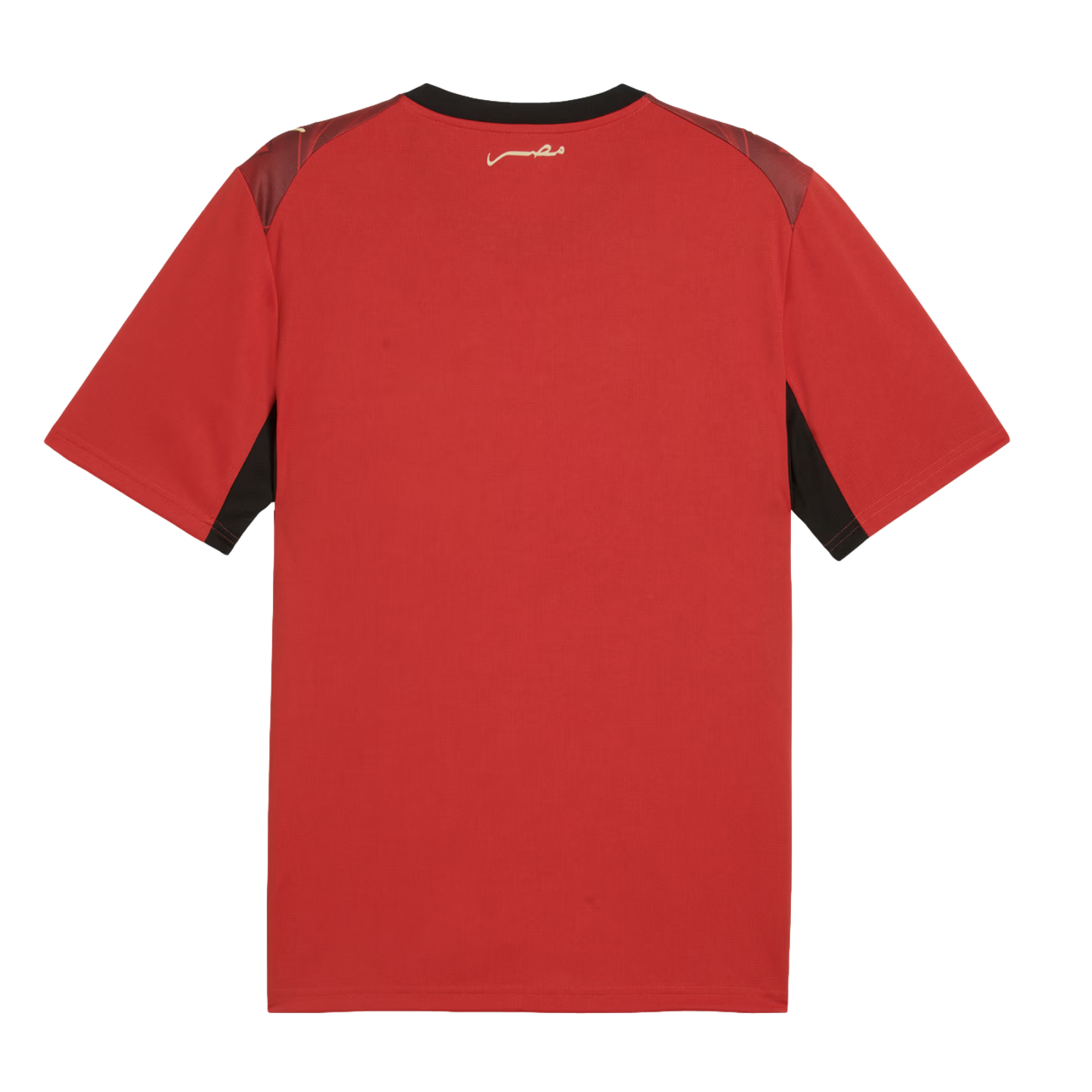 The back view of a red short-sleeved athletic jersey featuring a black collar, maroon shoulder panels, and black accents under the sleeves. A small, white Arabic script logo is centered below the back of the neck.