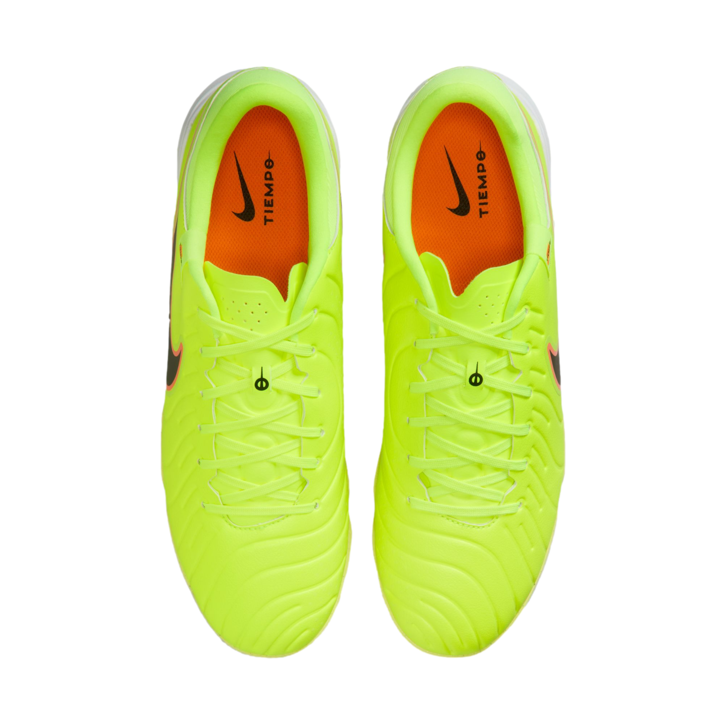 Top-down view of neon yellow Nike Tiempo soccer cleats with orange insoles, shown against a solid black background.