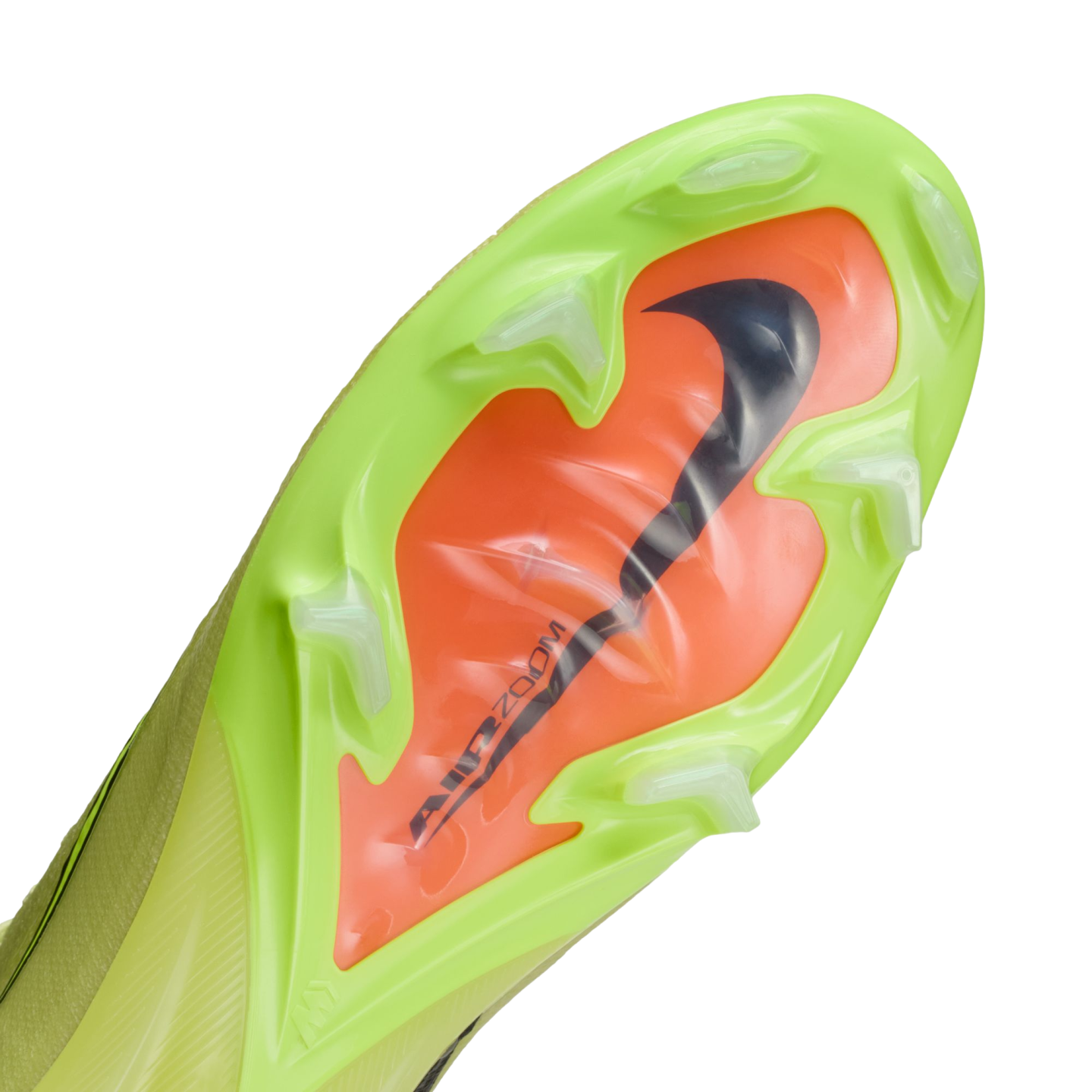 Underside of a lime green Nike soccer cleat with a bright orange 'Air Zoom' unit, black swoosh, and translucent studs.