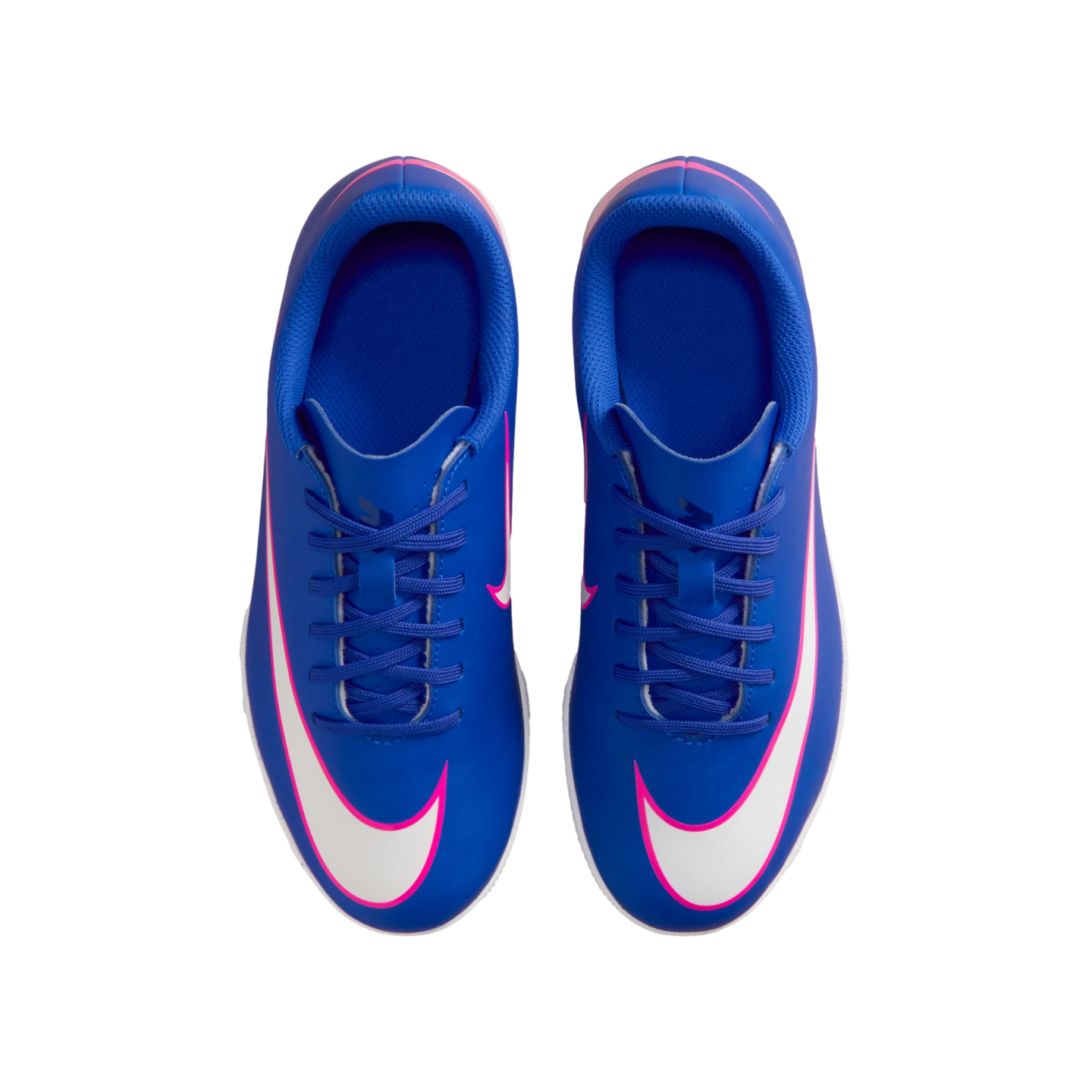 Top-down view of bright blue Nike soccer cleats with white and pink swooshes on a solid black background.
