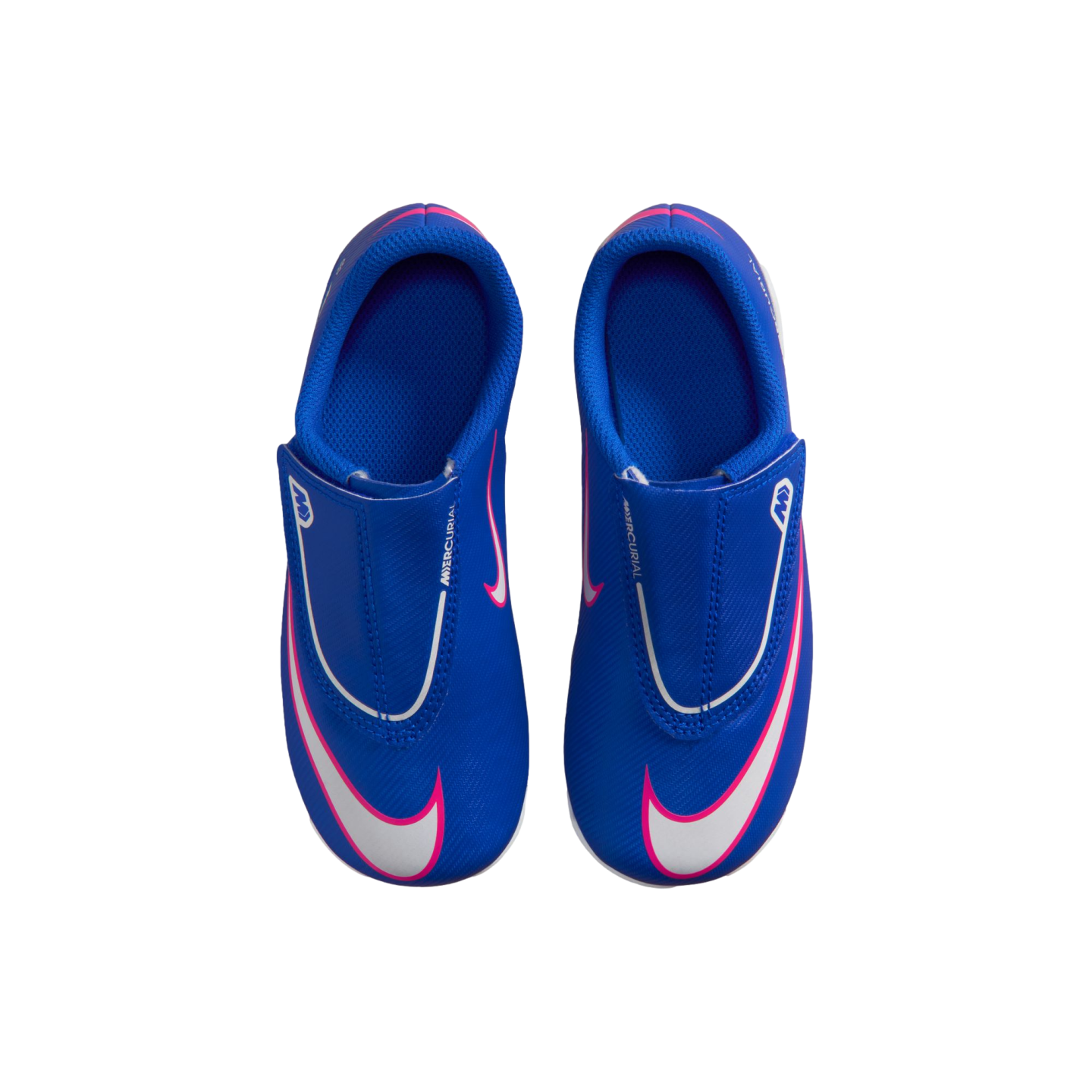 Top-down view of blue Nike Mercurial kids' soccer shoes with pink and white accents and a Velcro strap, on a black background.