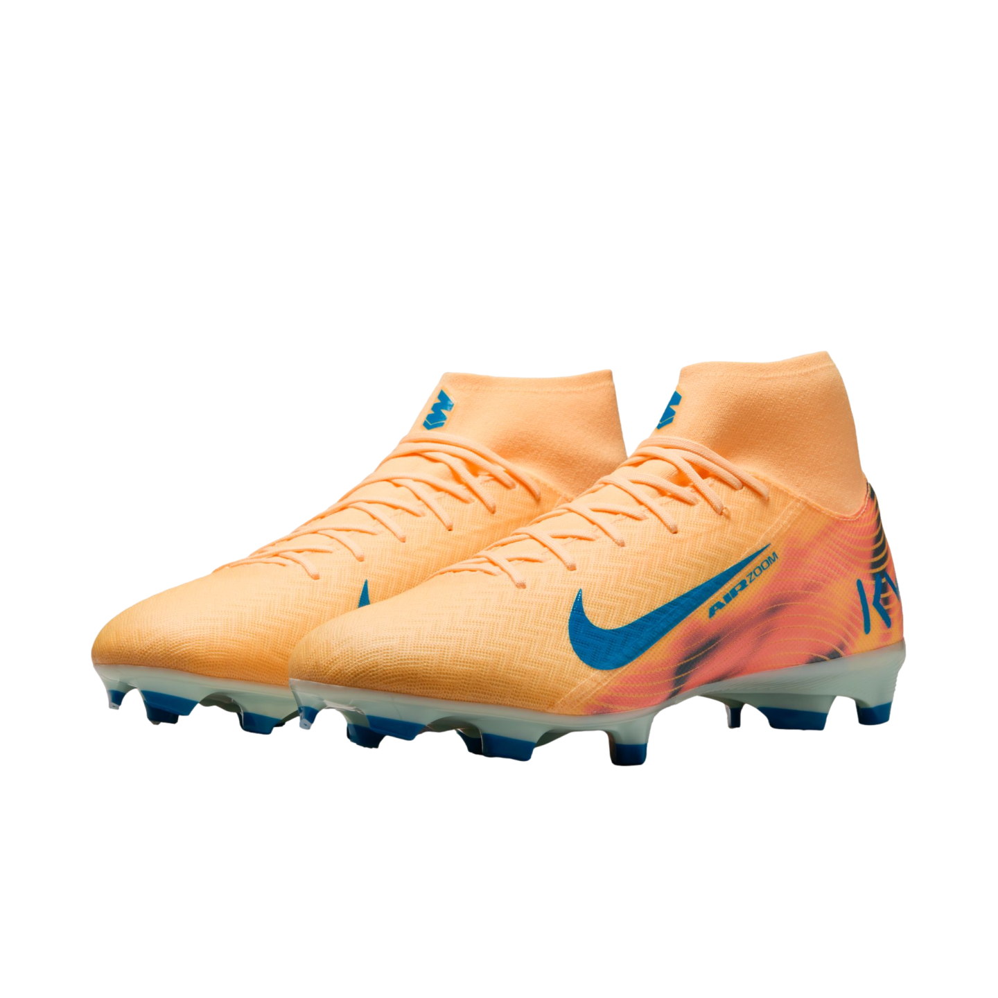 A pair of peach Nike Mercurial soccer cleats with blue accents and high-top collars, set against a solid black background.