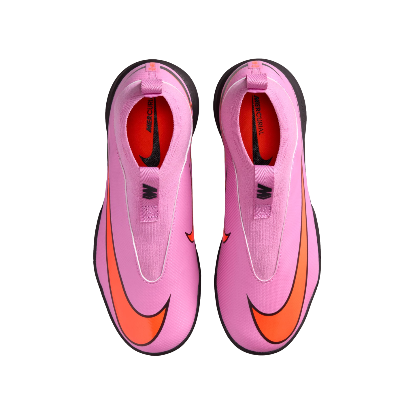 Top-down view of pink and orange Nike Mercurial laceless football boots against a black background.