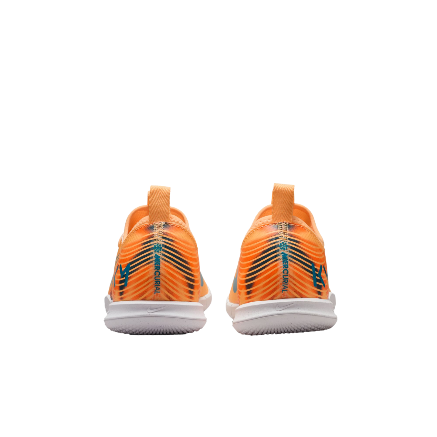 Rear view of a pair of bright orange Nike Mercurial indoor soccer shoes with black and teal accents and white soles, against a solid black background.