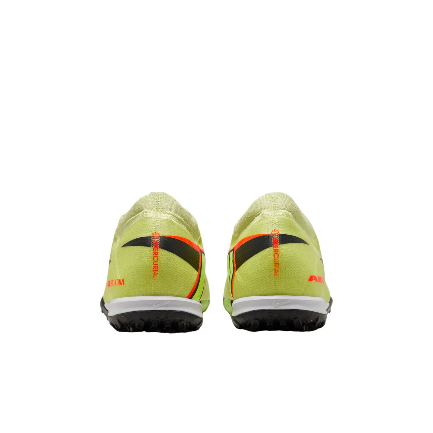 Rear view of two neon yellow Nike Mercurial turf soccer shoes with black and orange accents on a black background.