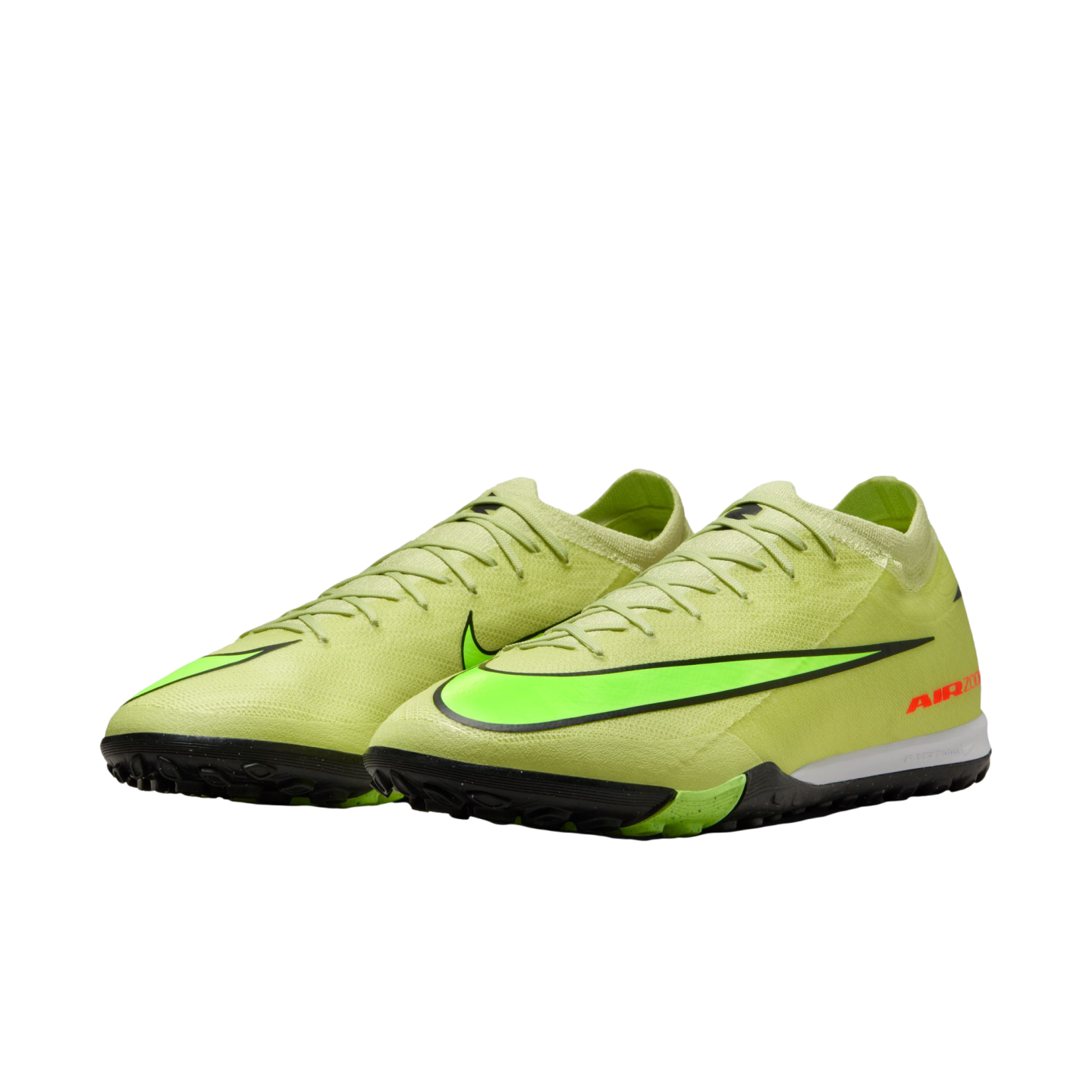 Lime green Nike Mercurial turf soccer shoes with a neon green swoosh and orange "AIR ZOOM" text, shown against a black background.