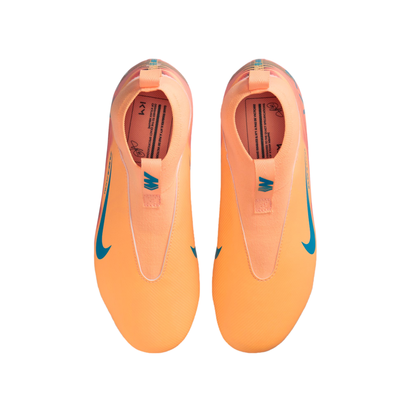 Top-down view of bright orange Nike Kylian Mbappé soccer cleats with blue swooshes on a black background.